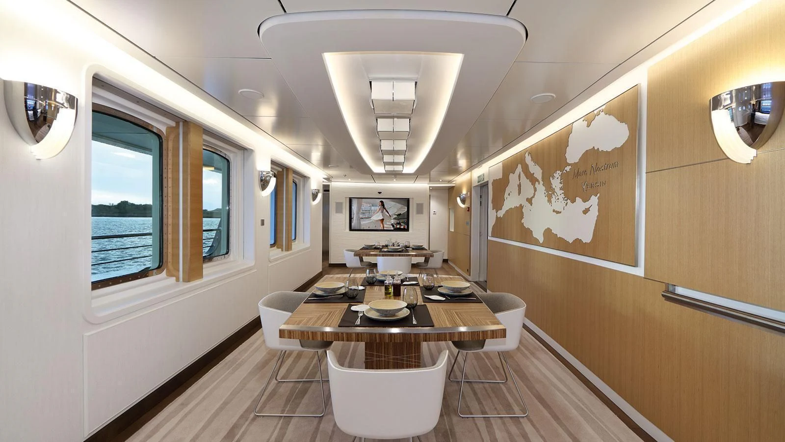 a large kitchen with a table aboard YERSIN Yacht for Charter