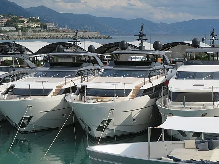 several boats are parked in a harbor aboard AMOUAJE Yacht for Sale