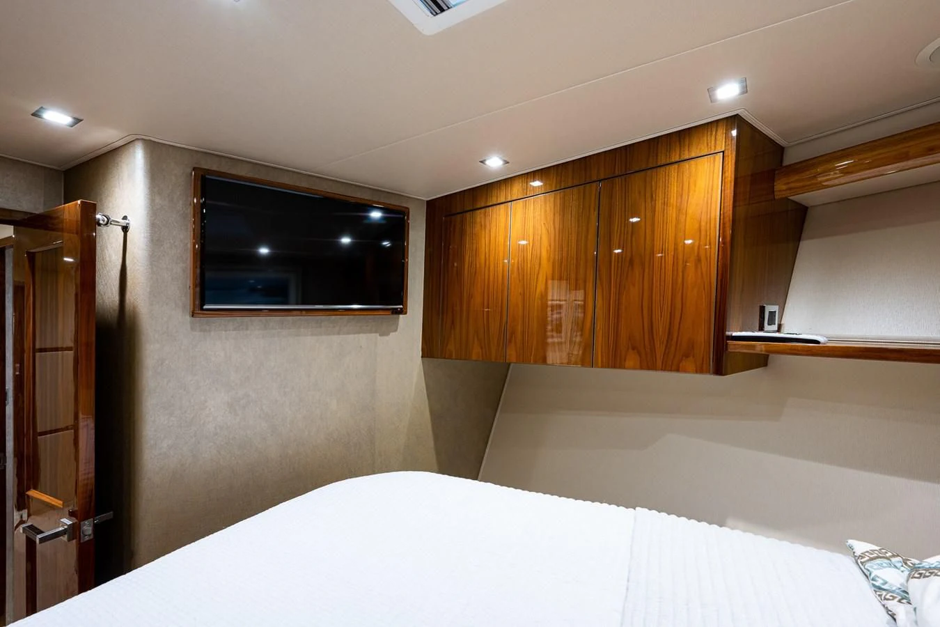 a room with a tv and a bed aboard ABSOLUT Yacht for Sale