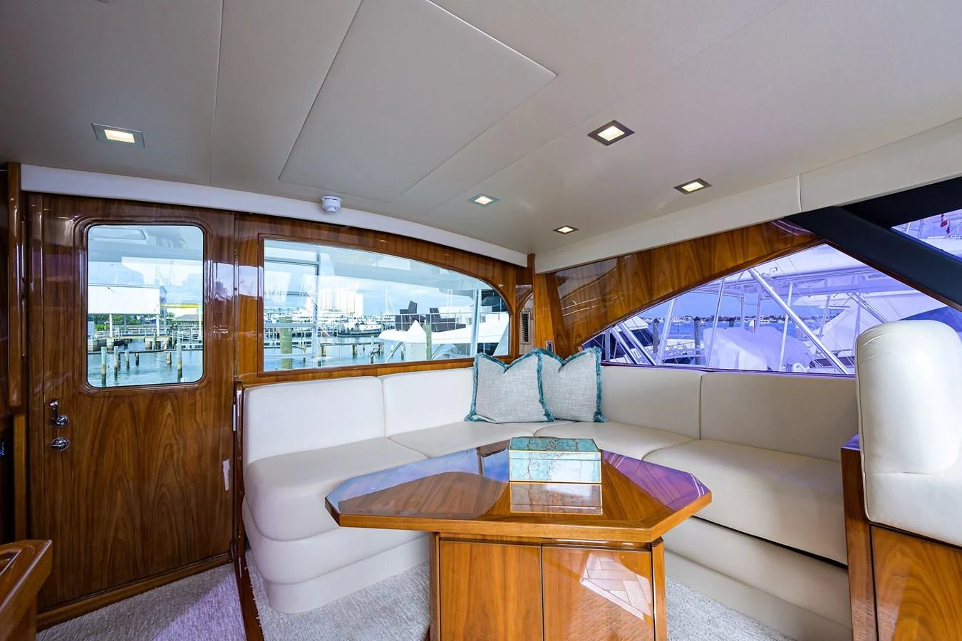 a living room with a couch and a table aboard ABSOLUT Yacht for Sale