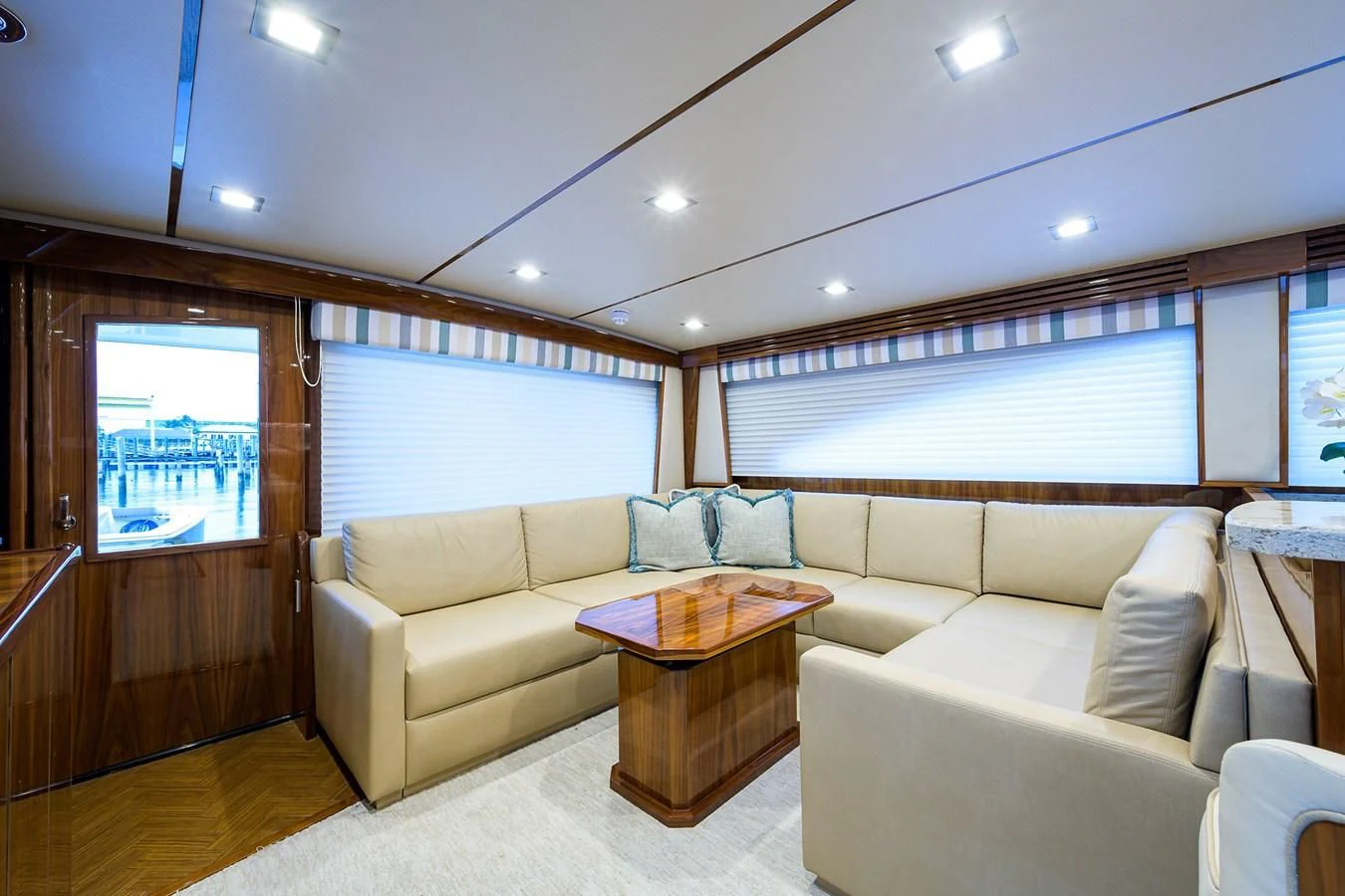 a living room with a couch and a coffee table aboard ABSOLUT Yacht for Sale