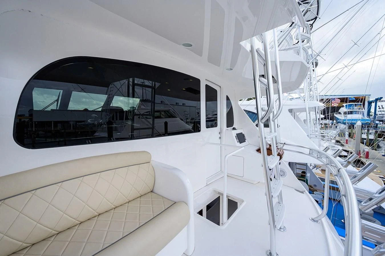 a white boat with a window aboard ABSOLUT Yacht for Sale