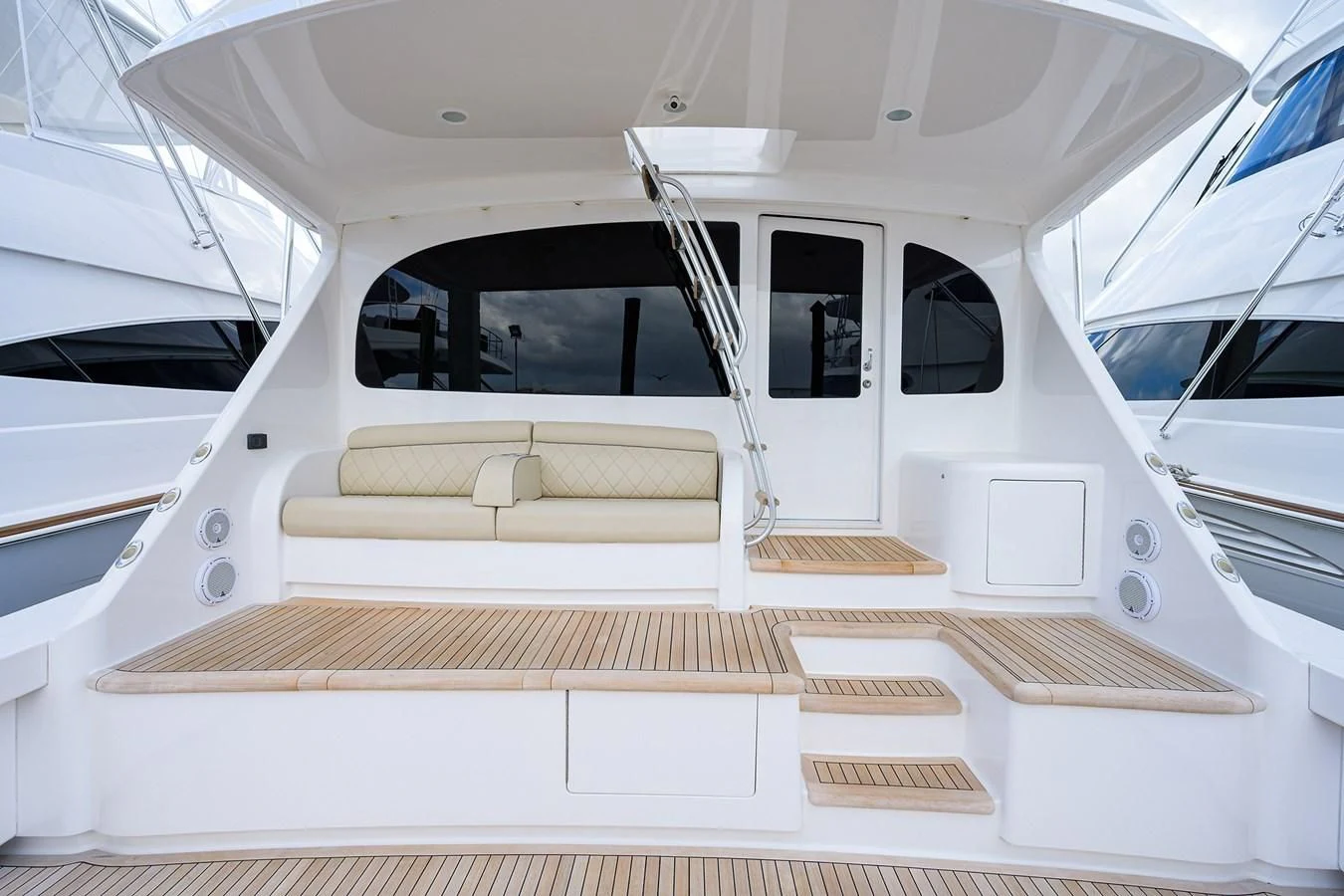a white boat with a bench aboard ABSOLUT Yacht for Sale