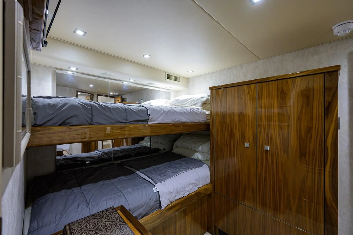 a room with bunk beds aboard ABSOLUT Yacht for Sale