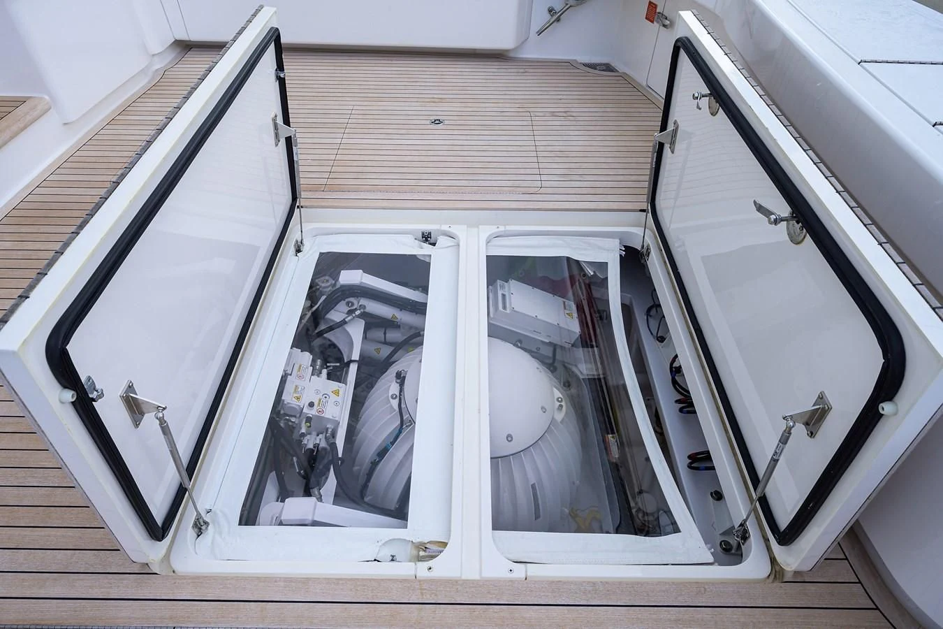 a group of people sitting in a car aboard ABSOLUT Yacht for Sale