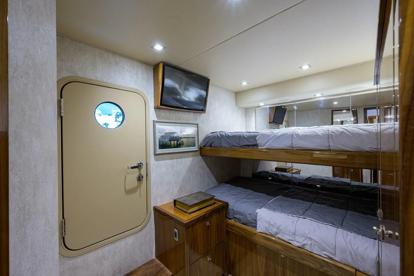 a room with a bed and a tv aboard ABSOLUT Yacht for Sale