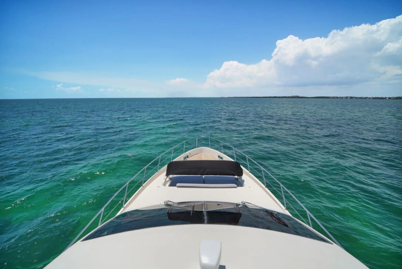 a white boat in the water aboard TABATA Yacht for Sale