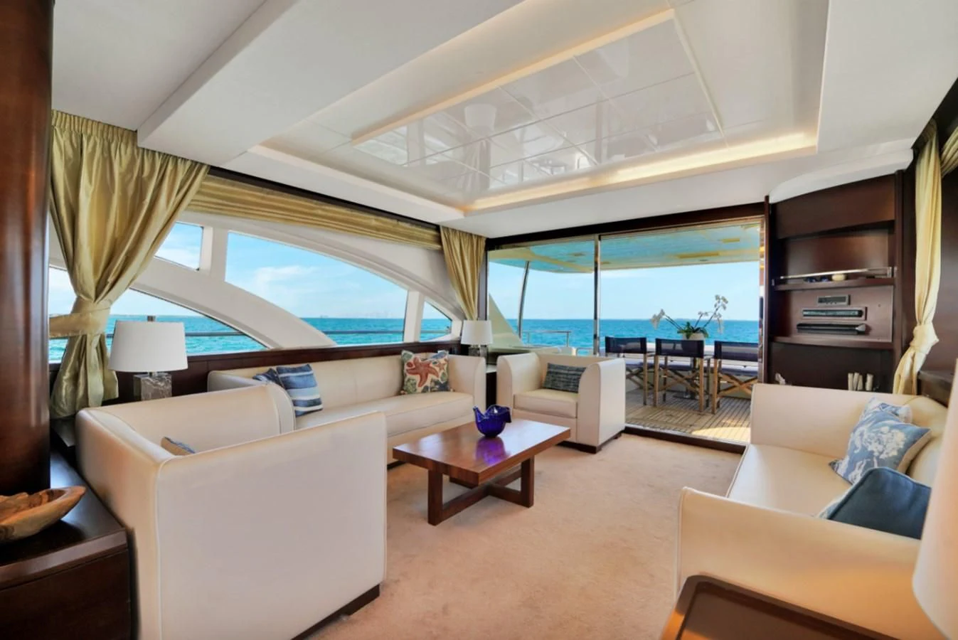 a living room with a large window aboard TABATA Yacht for Sale