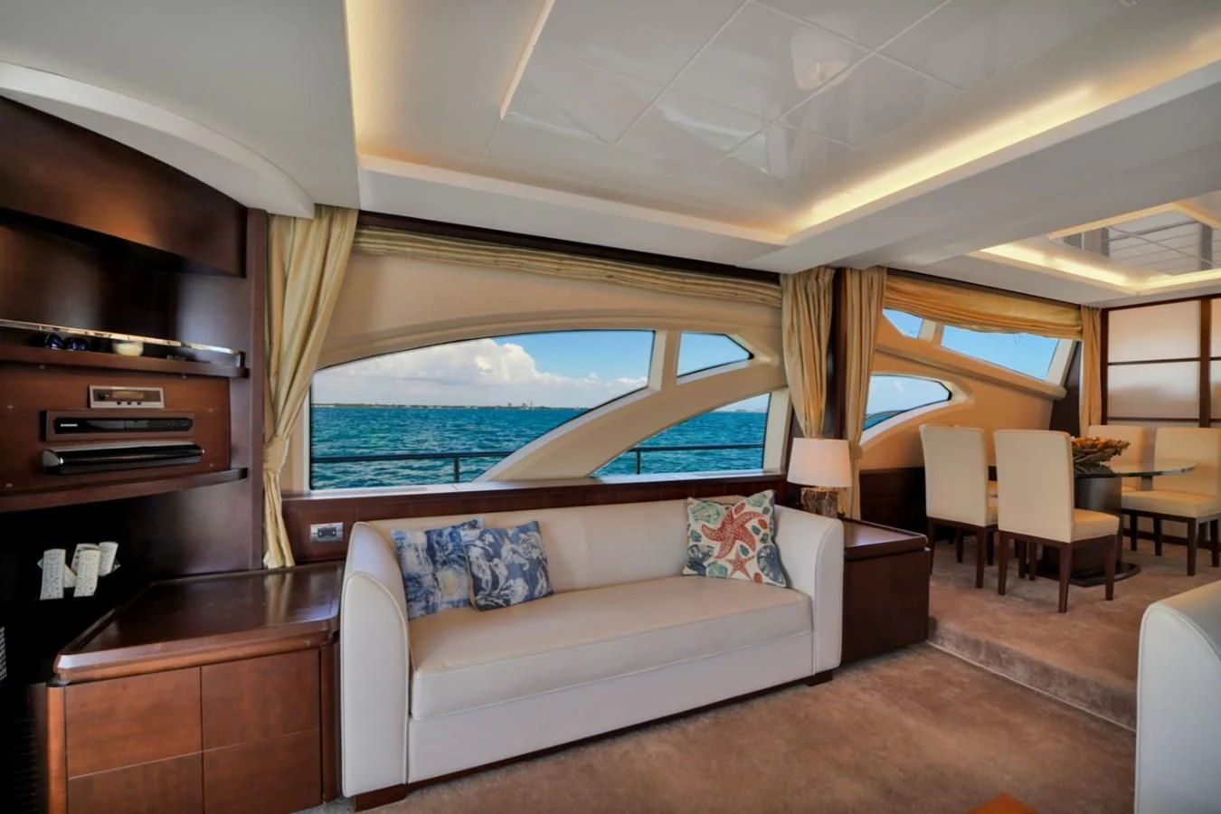 a living room with a large window aboard TABATA Yacht for Sale
