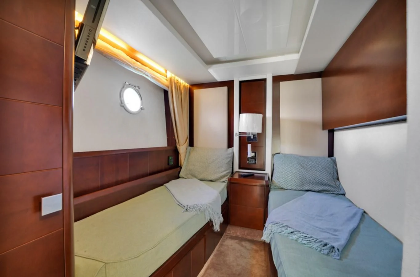 a room with two beds aboard TABATA Yacht for Sale