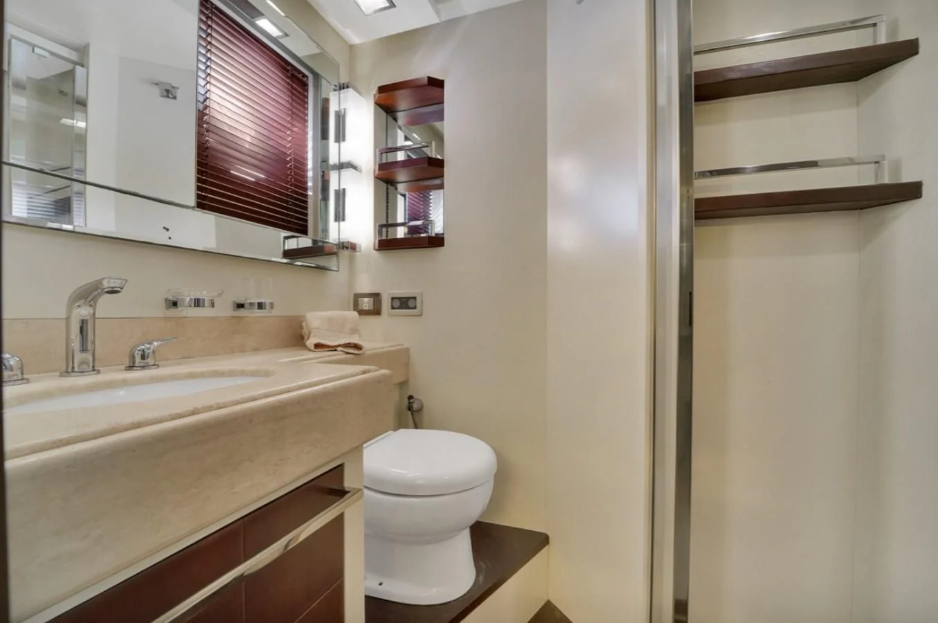 a bathroom with a sink and a toilet aboard TABATA Yacht for Sale