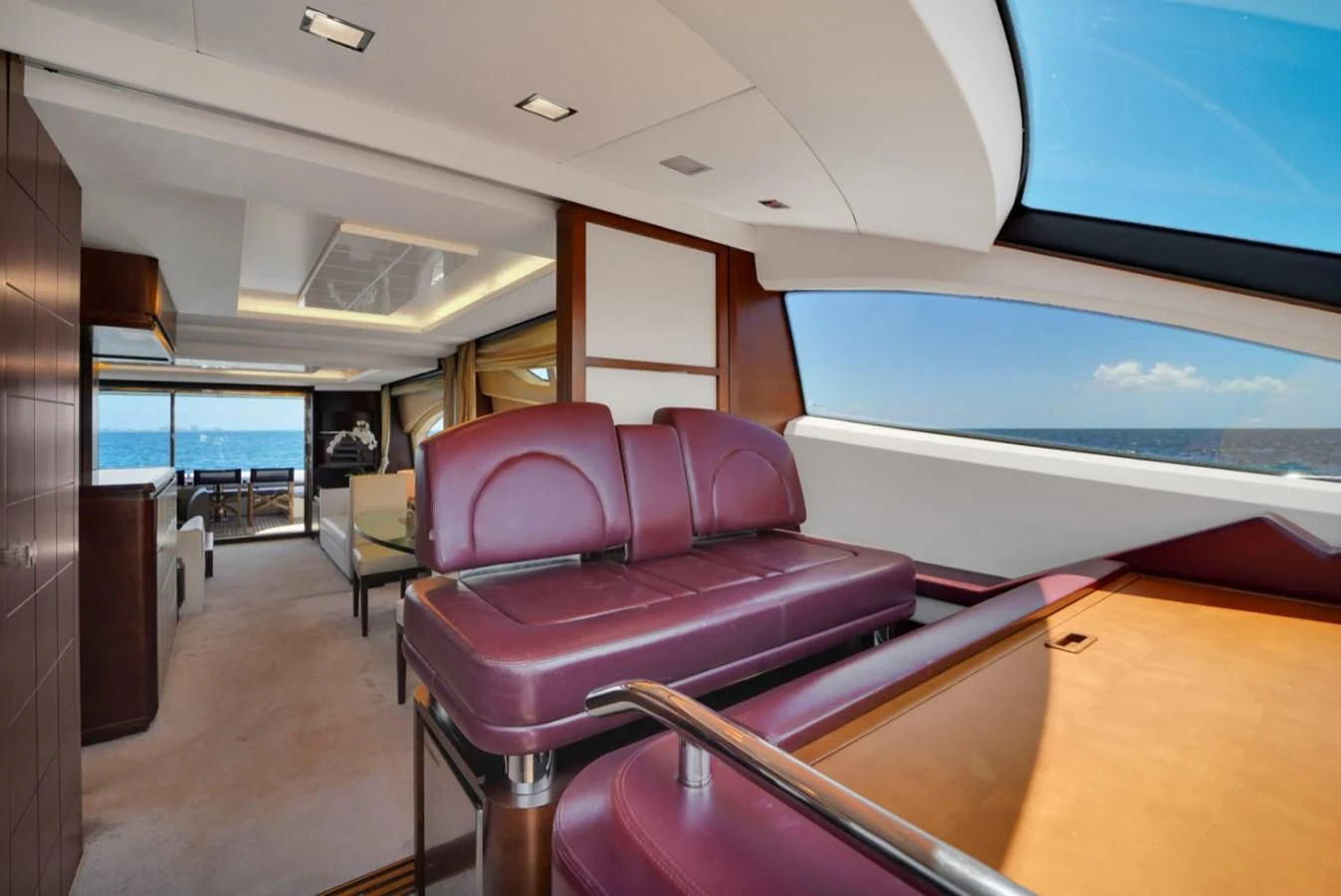 a room with a large window and a view of the water aboard TABATA Yacht for Sale