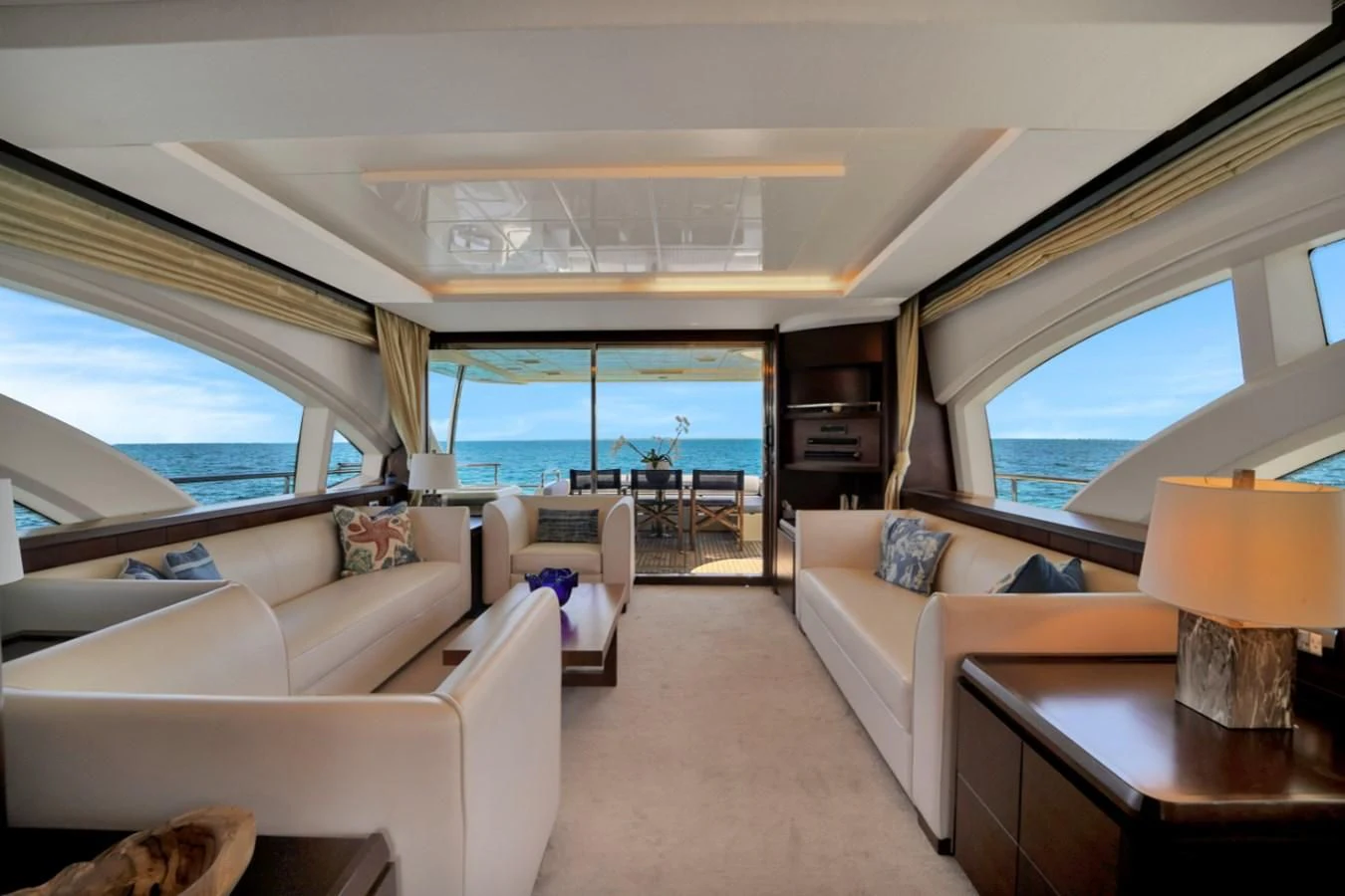 a living room with a large window aboard TABATA Yacht for Sale