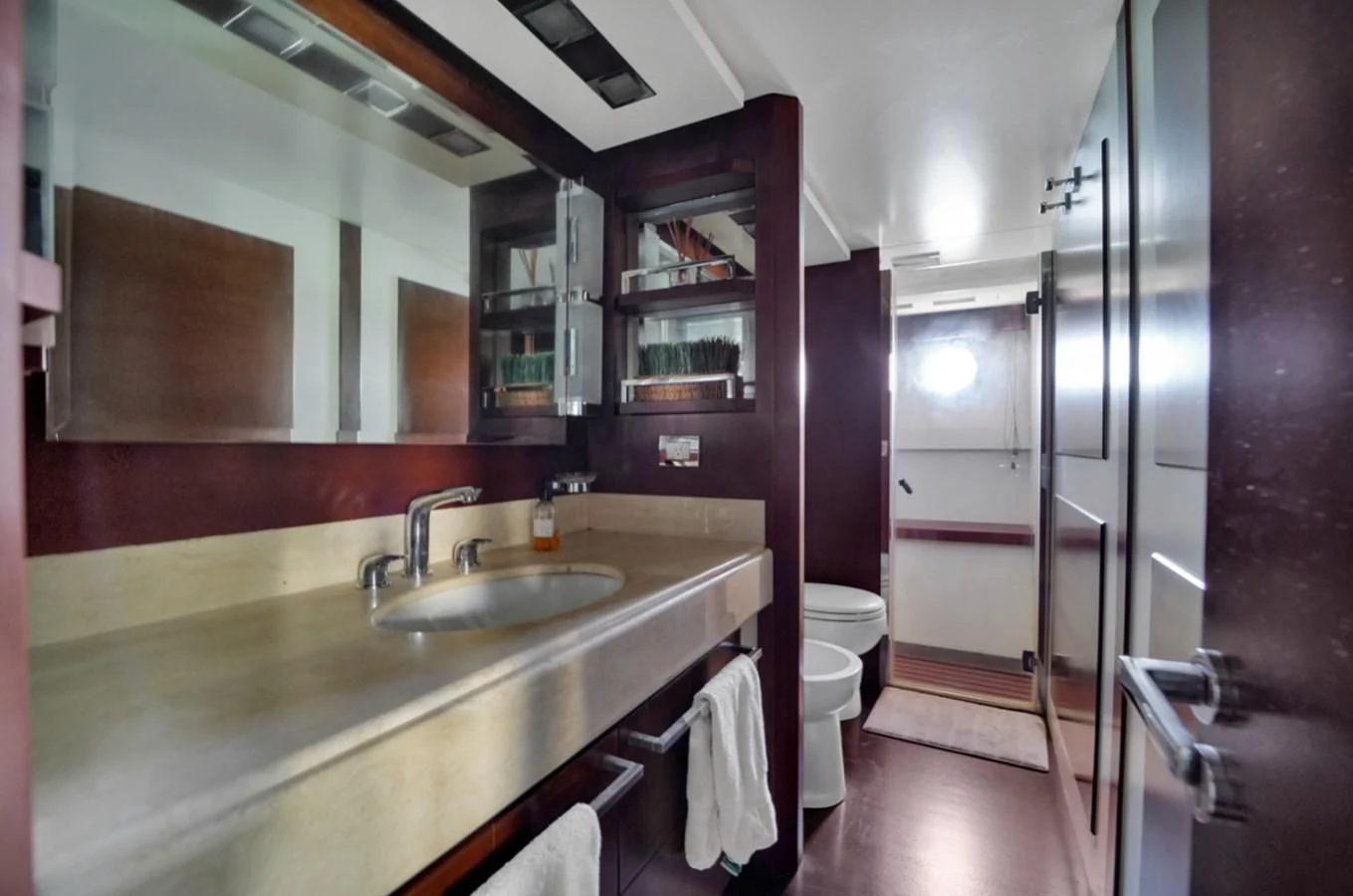 a bathroom with a sink and a mirror aboard TABATA Yacht for Sale