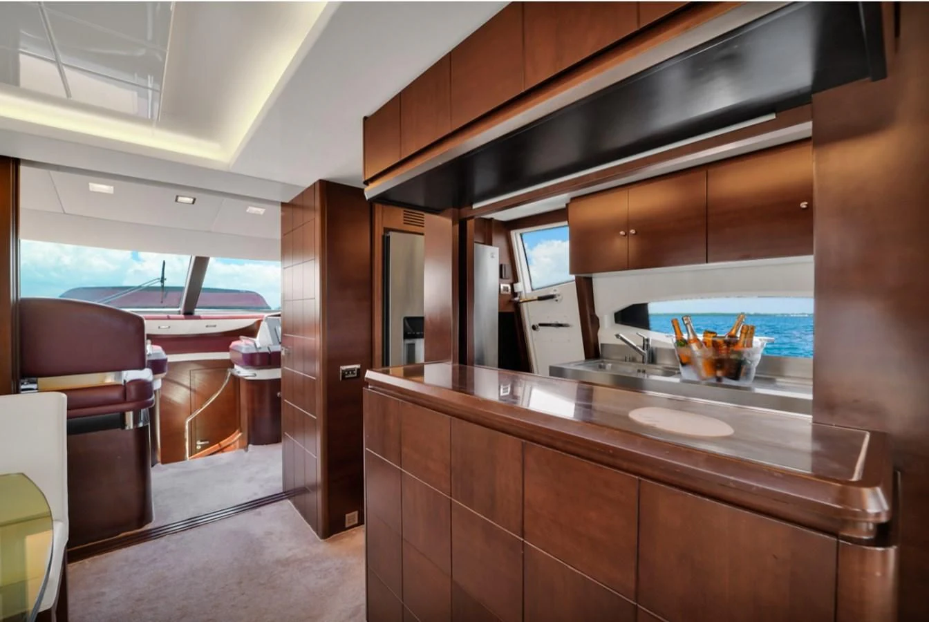 a kitchen with a large island aboard TABATA Yacht for Sale