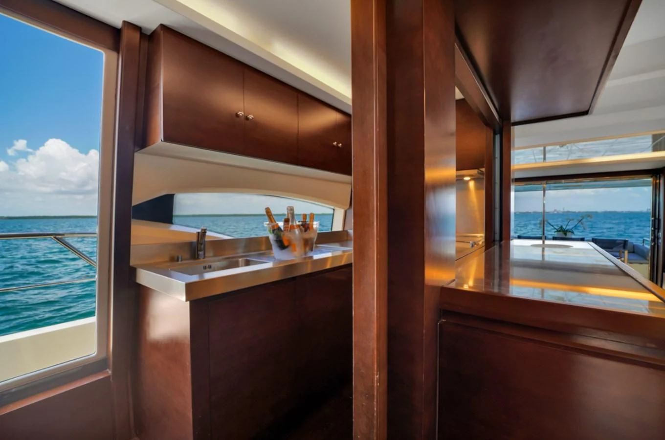 a kitchen with a large window aboard TABATA Yacht for Sale