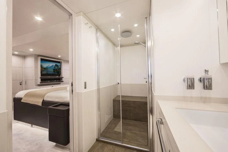 a bathroom with a large glass shower aboard NICOSTASIA Yacht for Sale