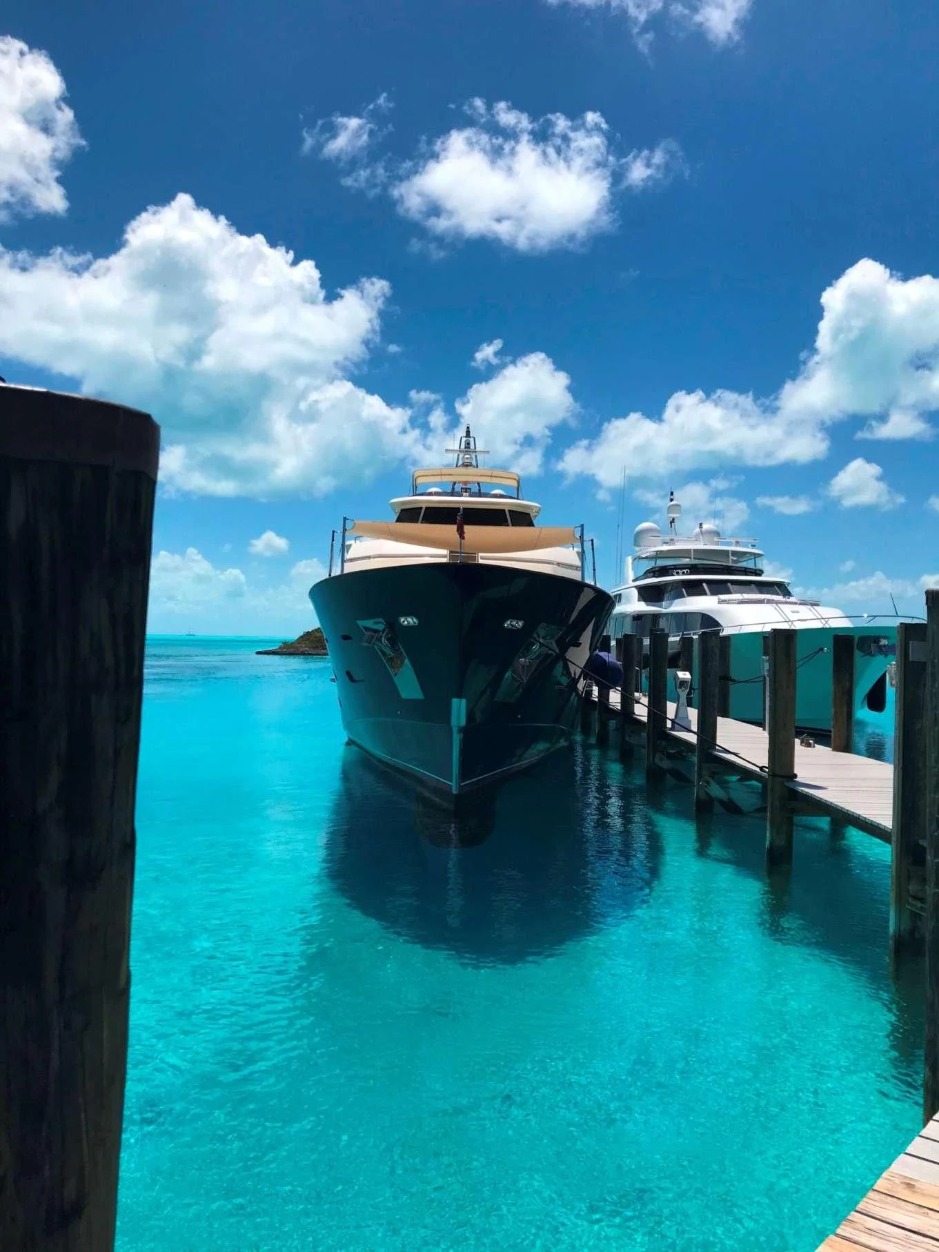 a boat docked at a pier aboard NOMADA Yacht for Charter