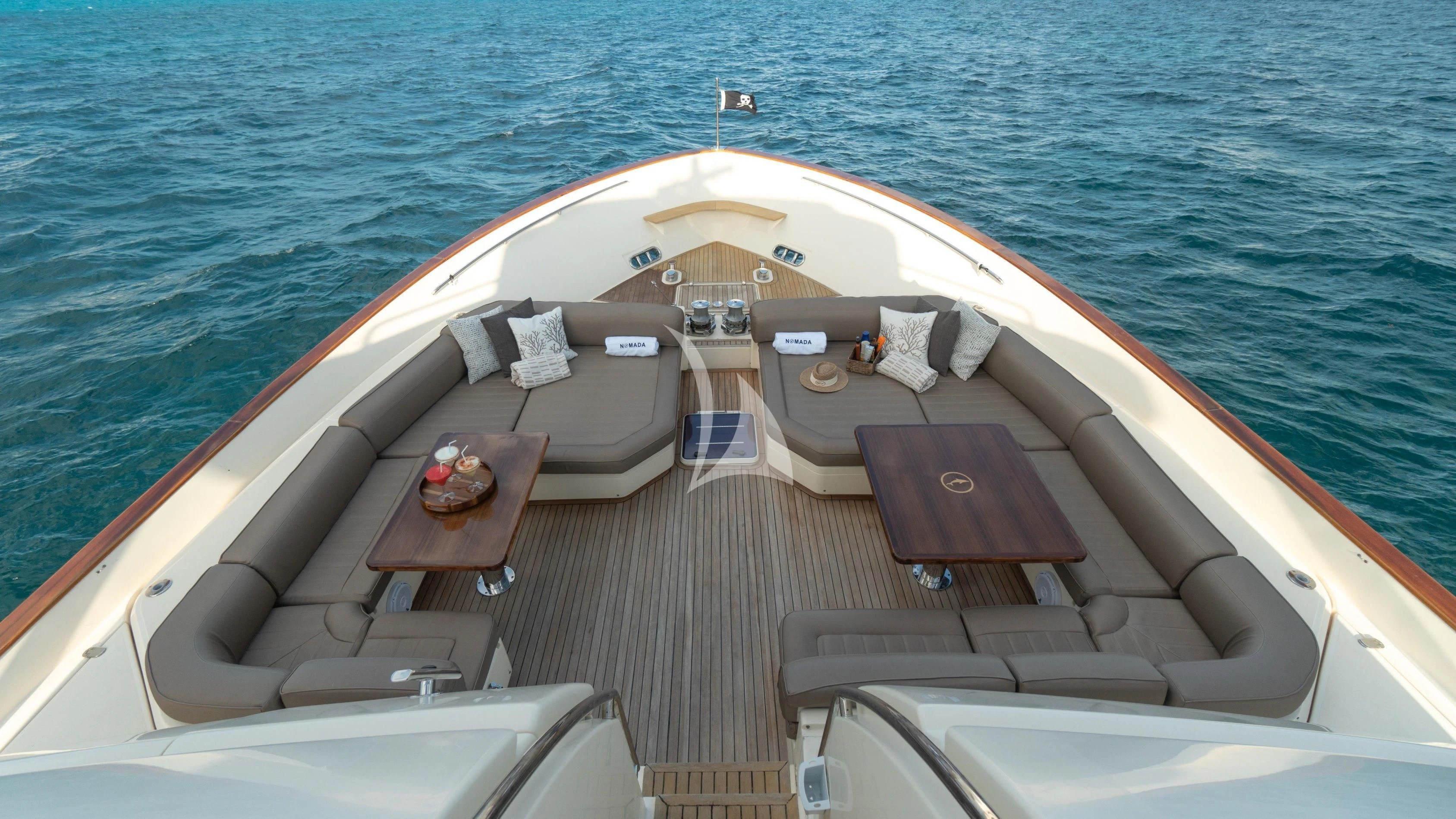 a boat on the water aboard NOMADA Yacht for Charter