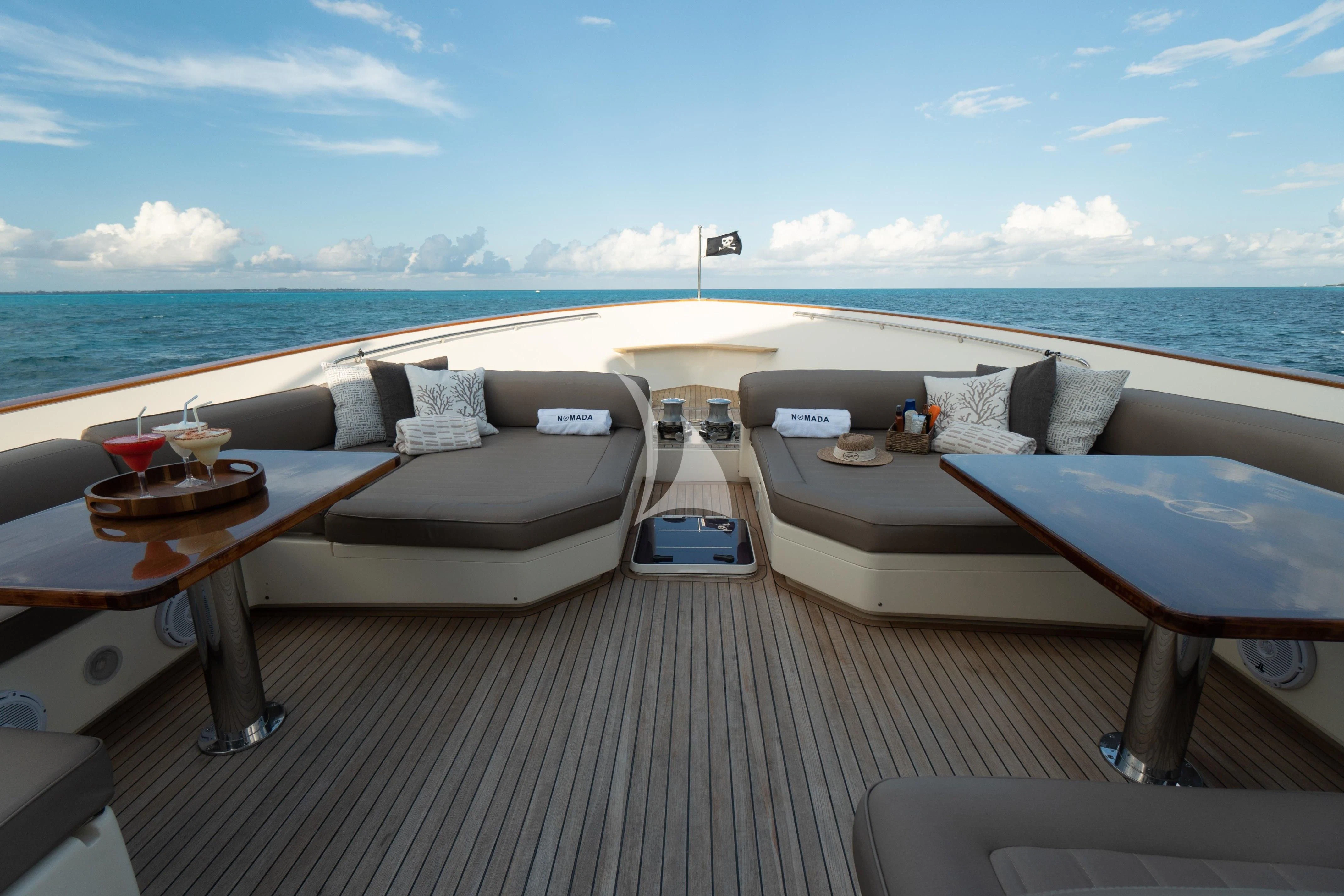a boat on a deck aboard NOMADA Yacht for Charter