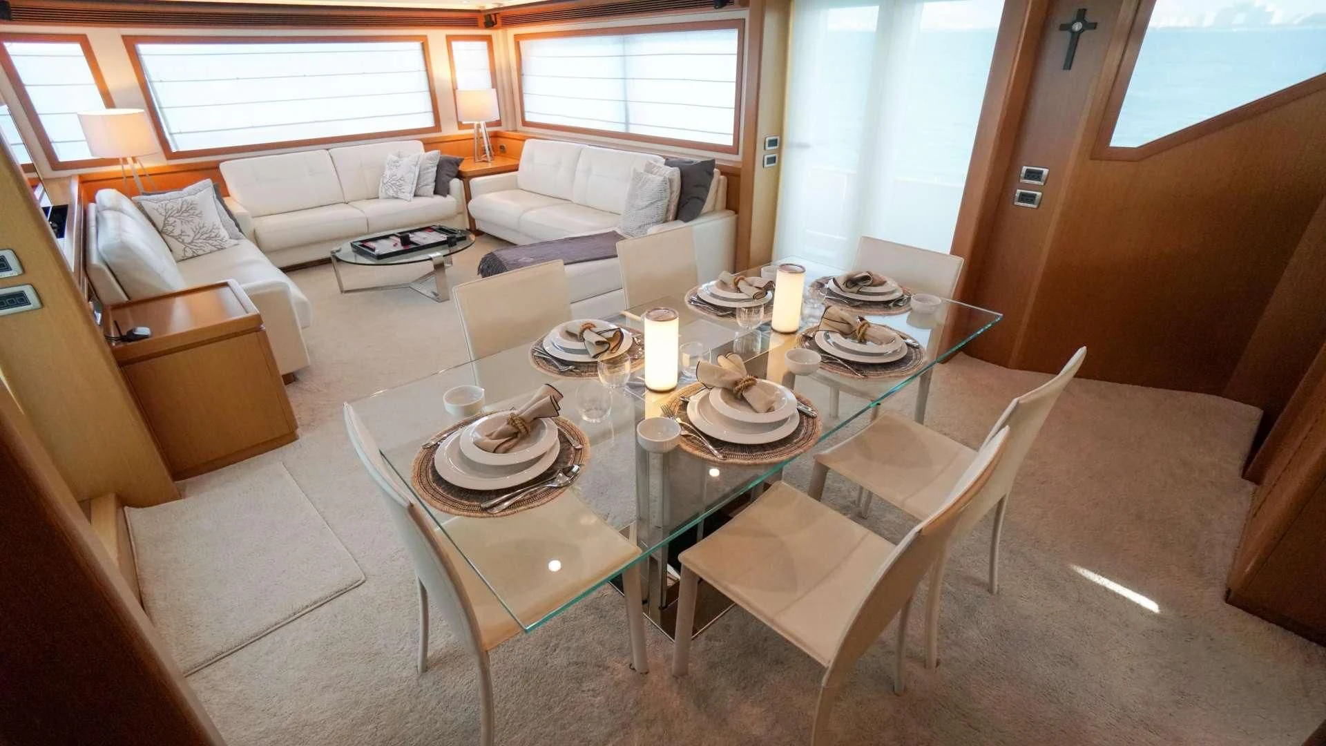 a dining room with a table set aboard NOMADA Yacht for Charter