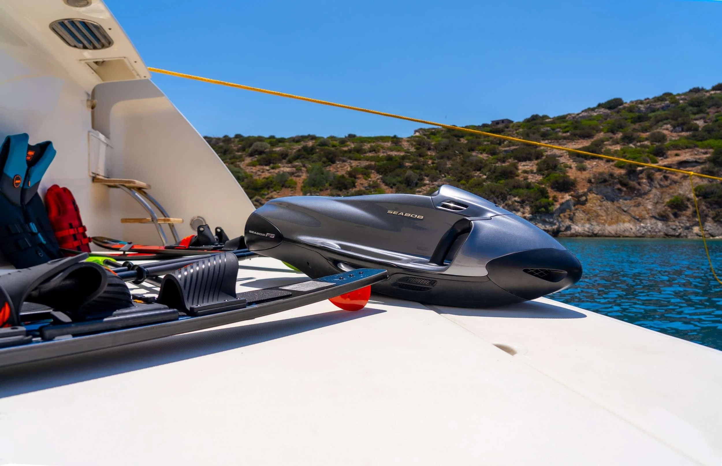 a black and silver boat on a lake aboard SOFIA D Yacht for Sale