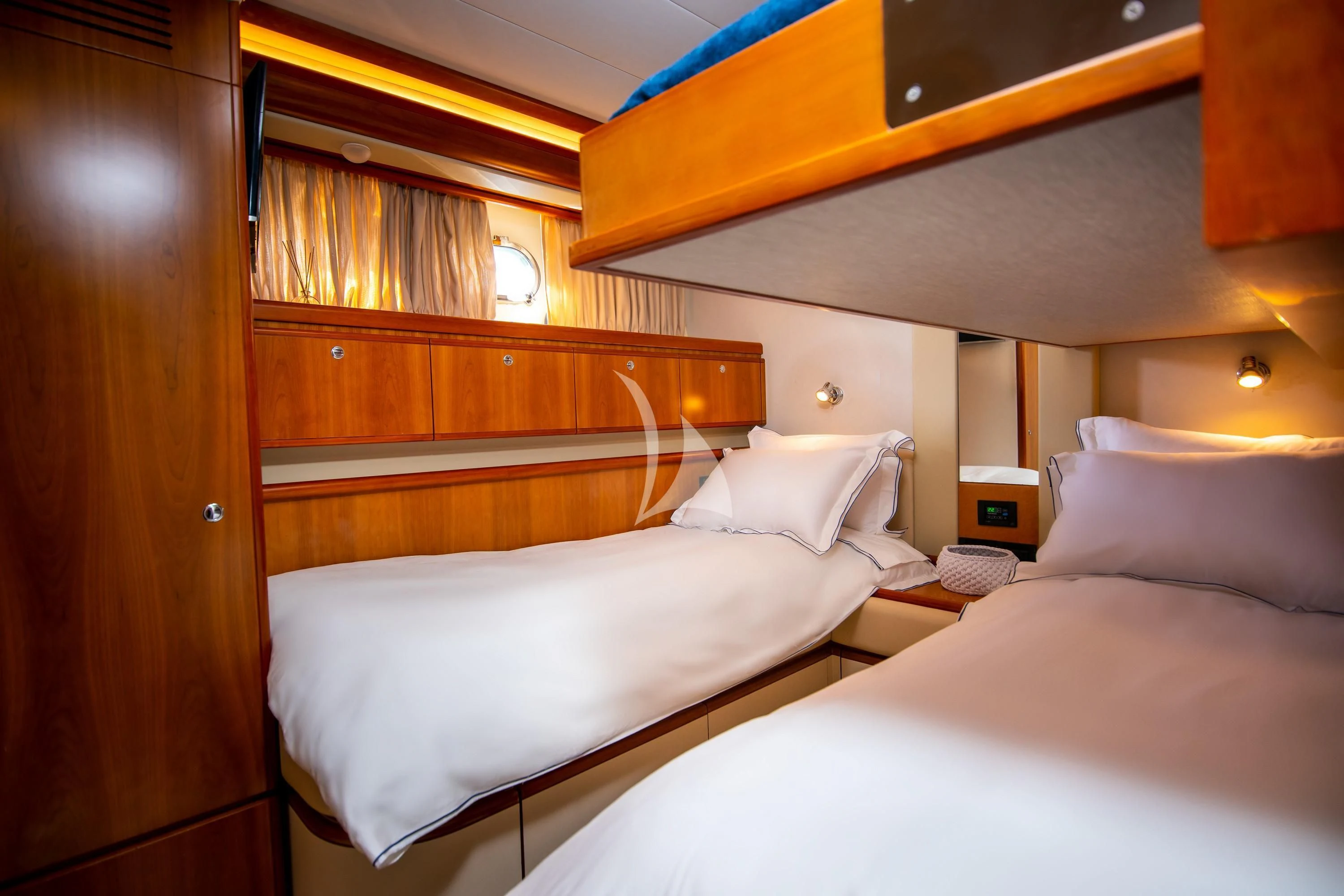 a room with two beds aboard SOFIA D Yacht for Sale