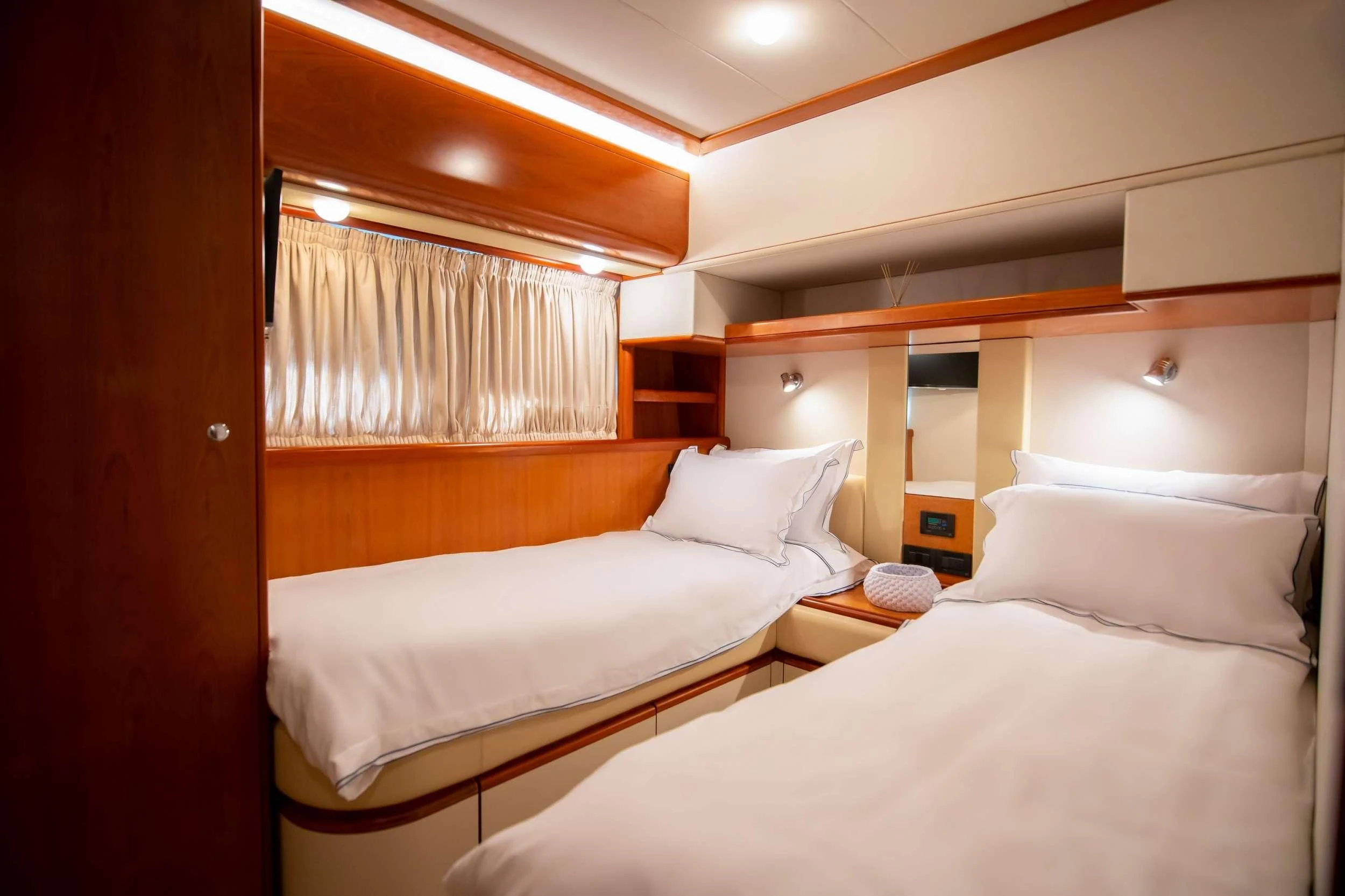 a room with two beds aboard SOFIA D Yacht for Sale