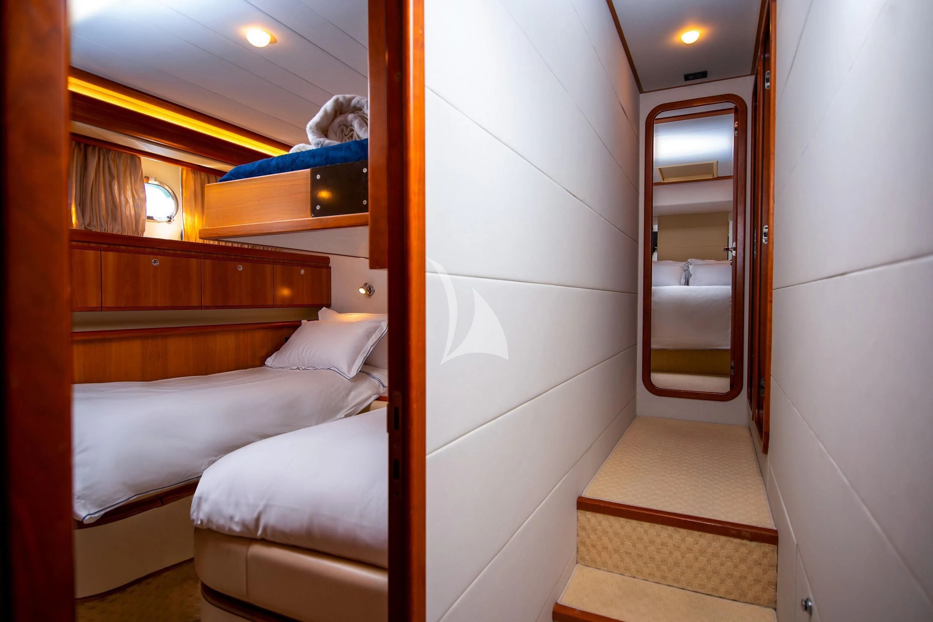 a room with a bed and a mirror aboard SOFIA D Yacht for Sale