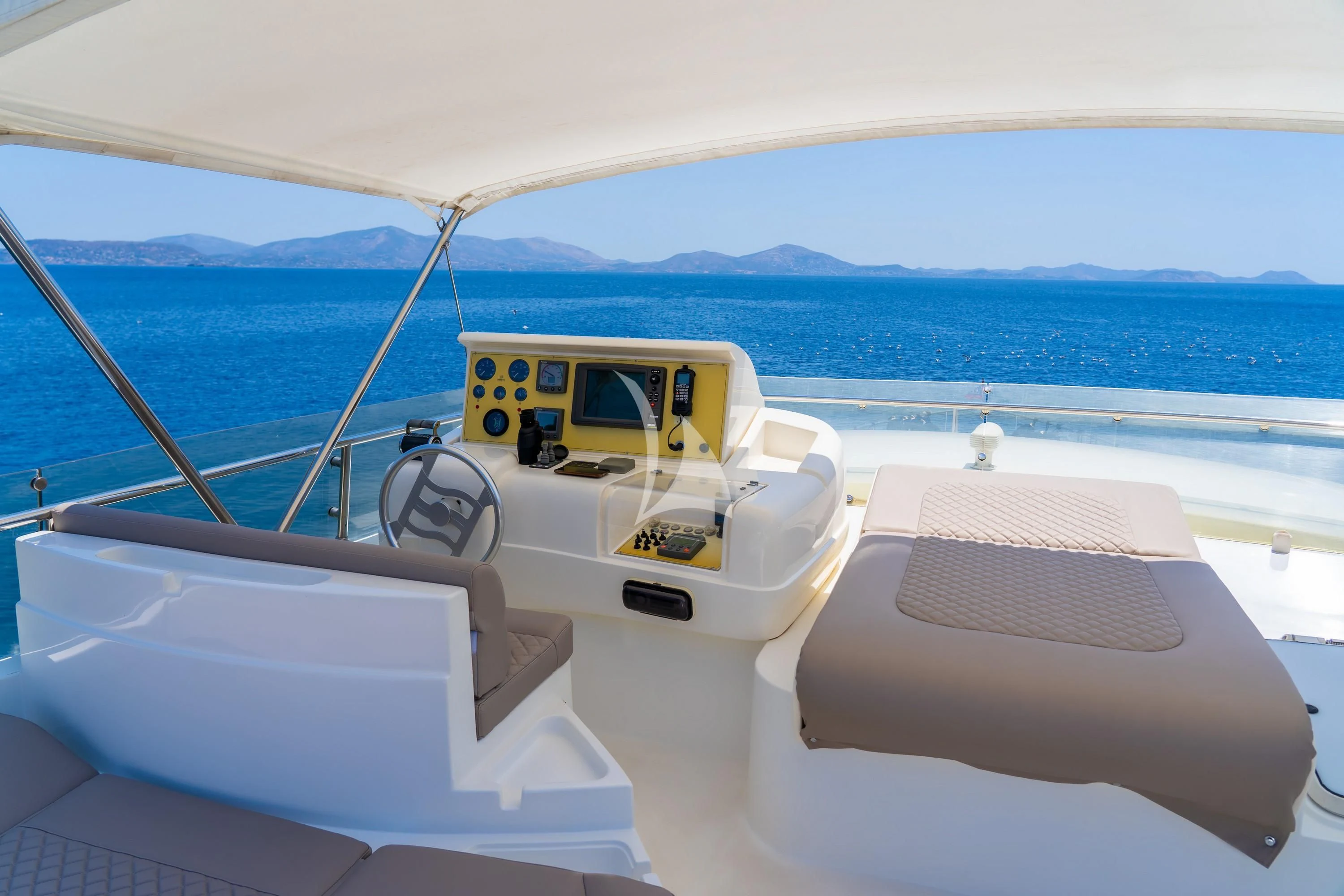 a yellow and white machine on a boat aboard SOFIA D Yacht for Sale