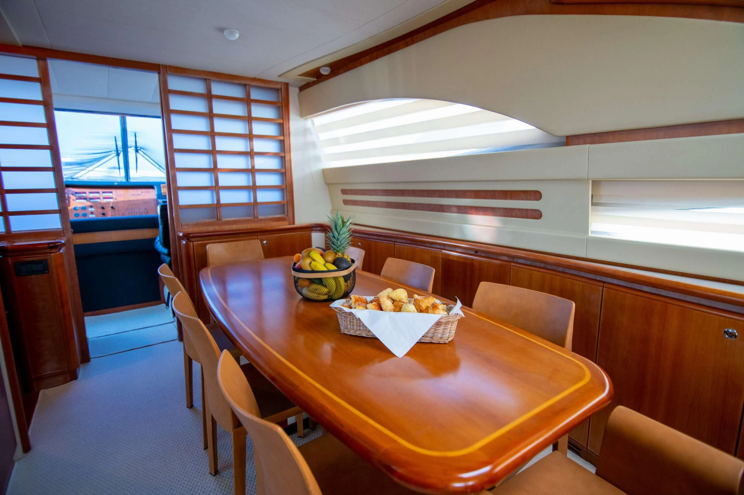 a dining table in a room aboard SOFIA D Yacht for Sale