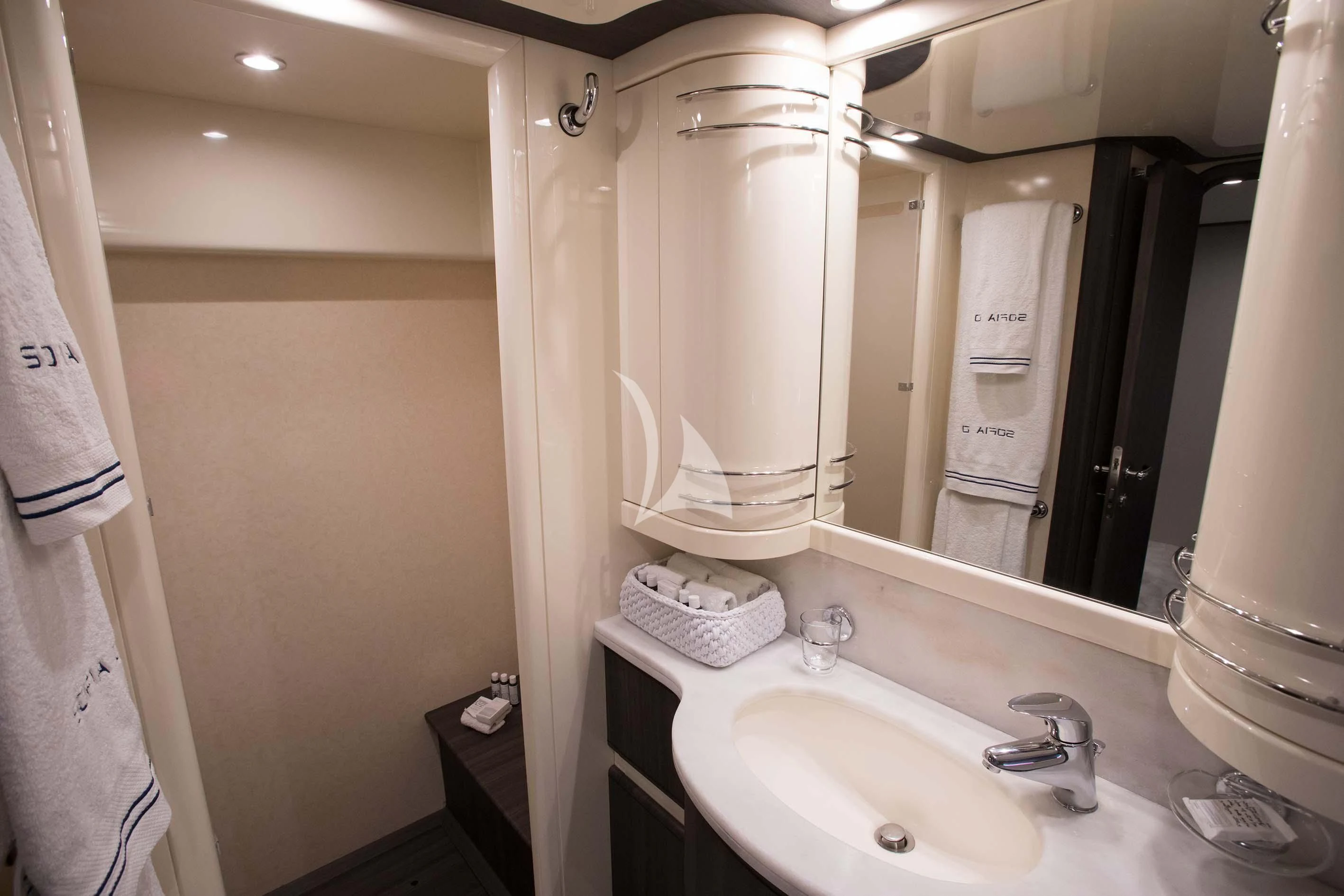 a bathroom with a sink and a mirror aboard SOFIA D Yacht for Sale