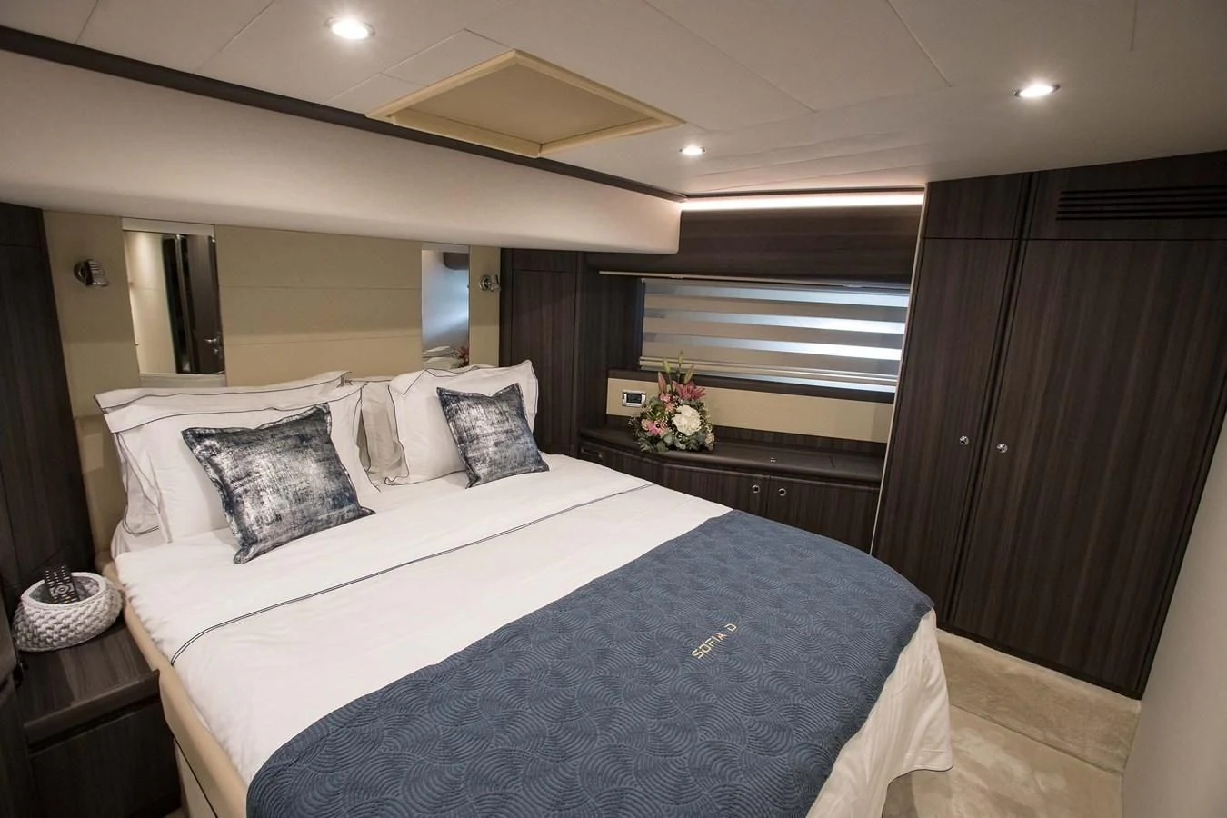 a bed with white sheets aboard SOFIA D Yacht for Sale