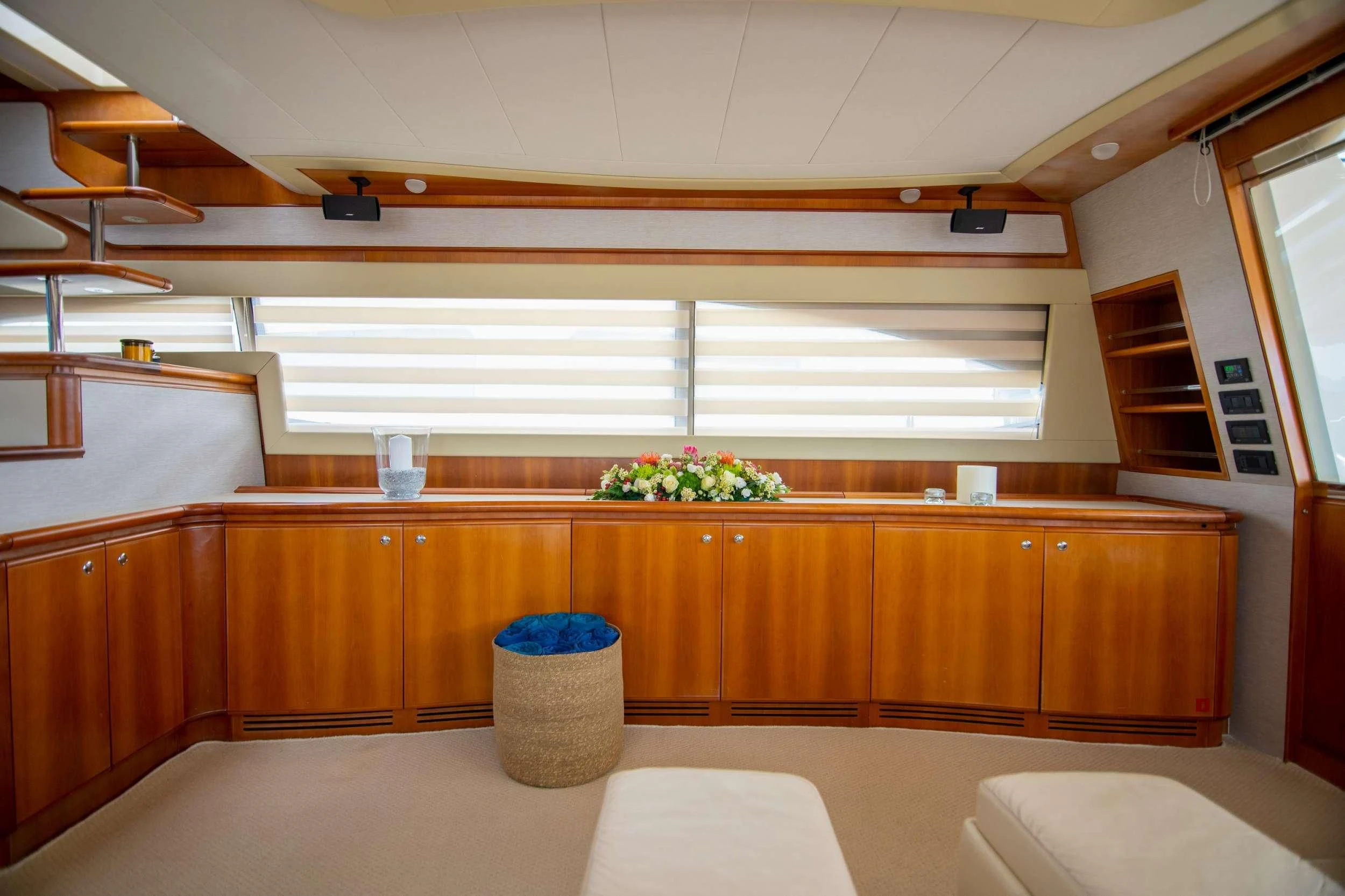 a kitchen with wooden cabinets aboard SOFIA D Yacht for Sale