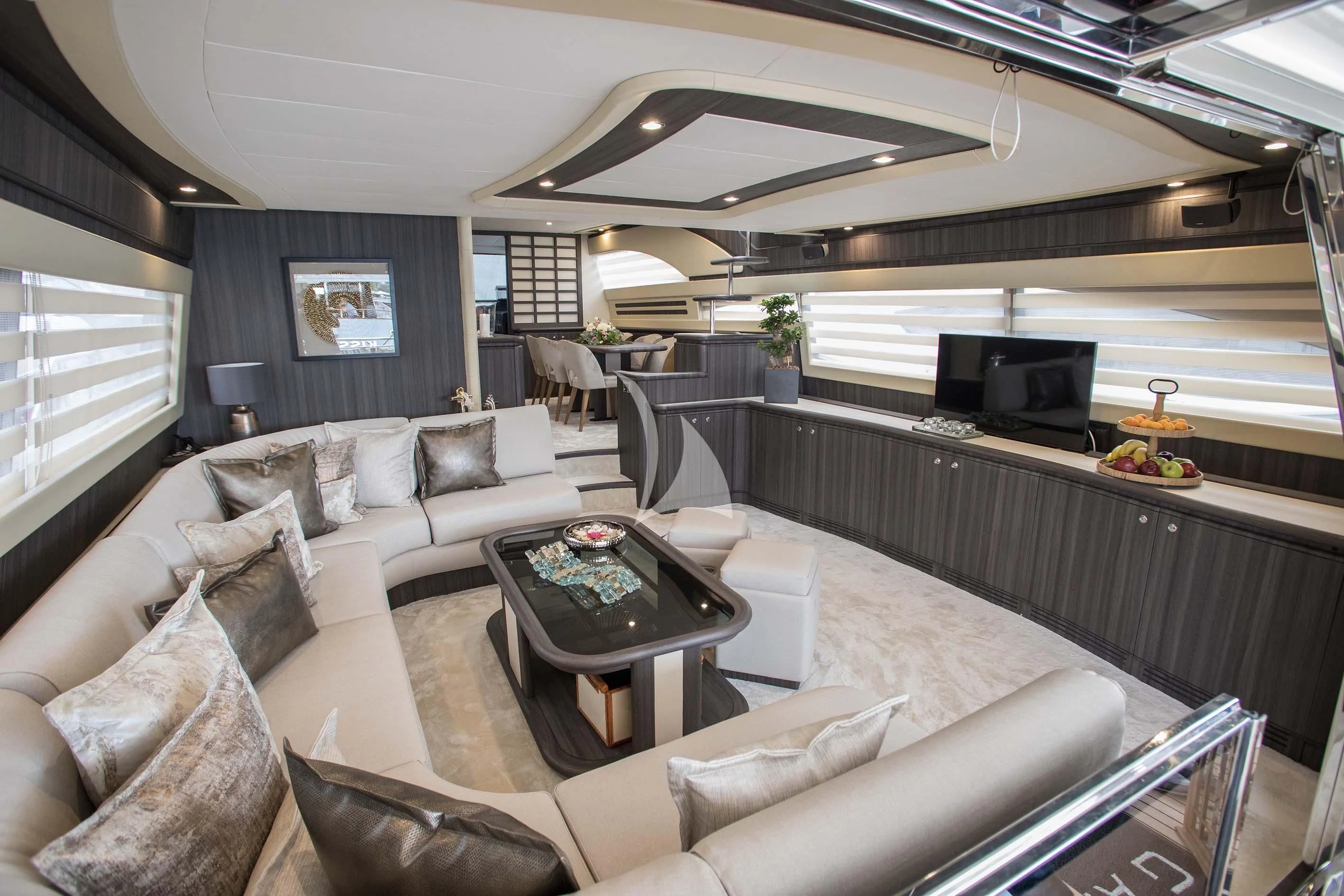 a living room with a large window aboard SOFIA D Yacht for Sale