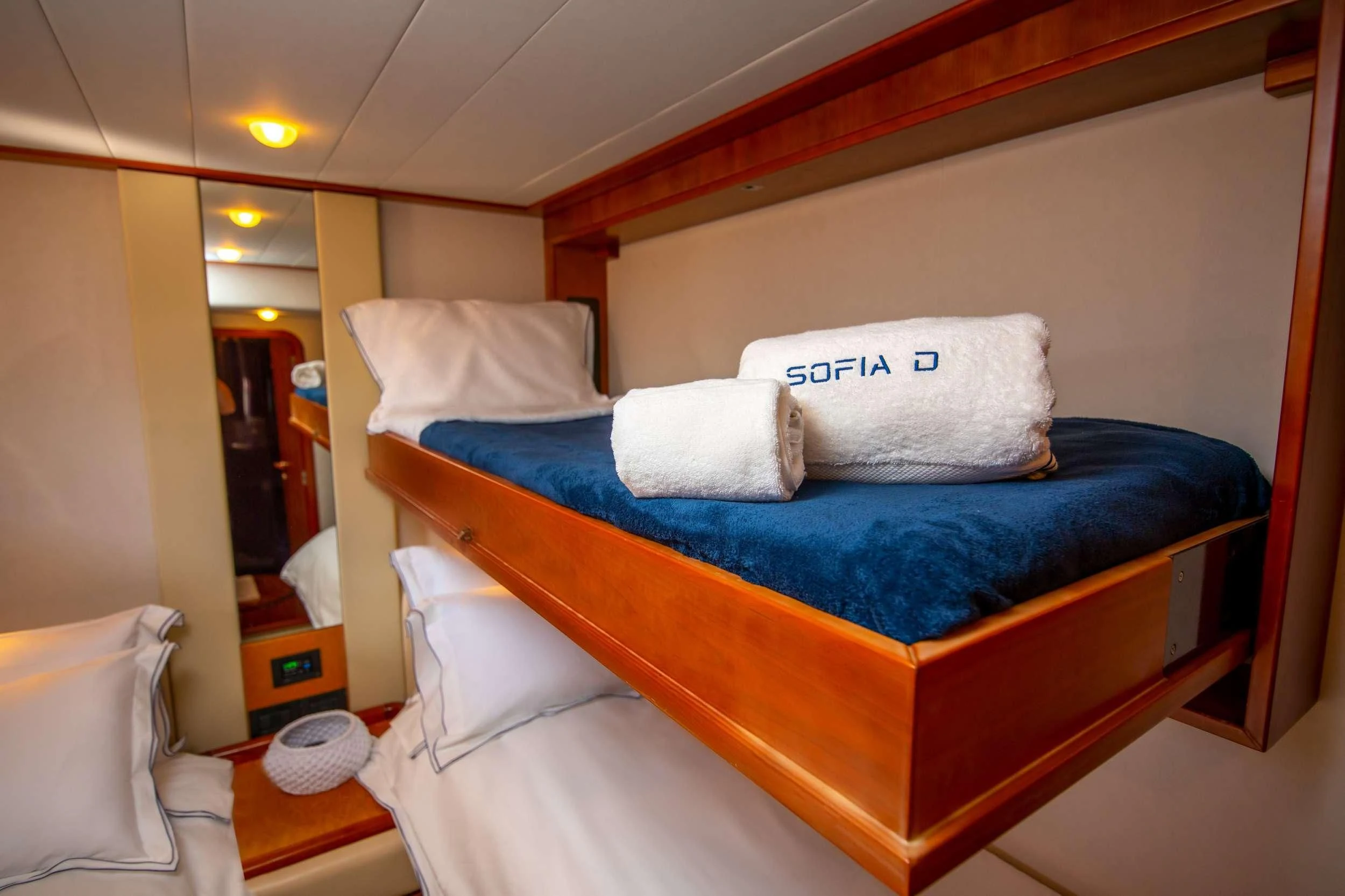 a bed with pillows on it aboard SOFIA D Yacht for Sale