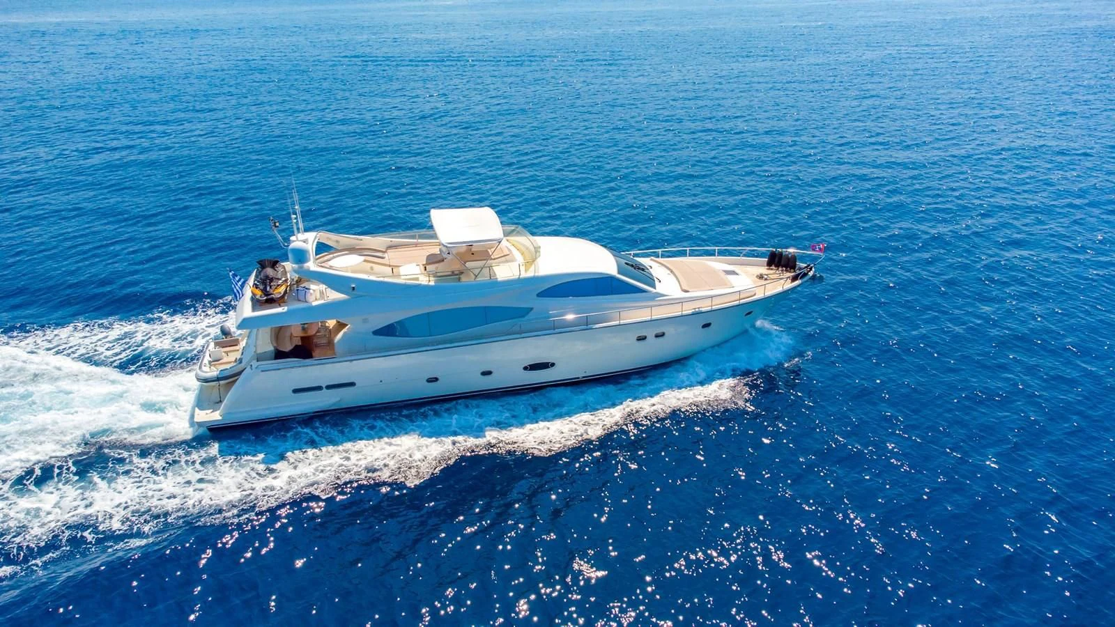 a white yacht on the water aboard SOFIA D Yacht for Sale