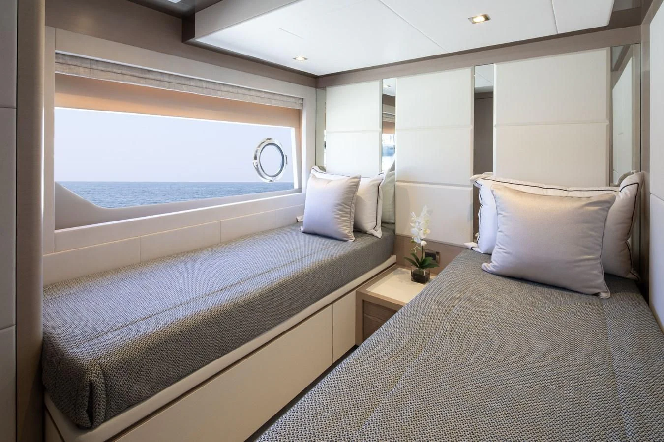 a room with two beds aboard MAKE BIG HAPPEN Yacht for Sale