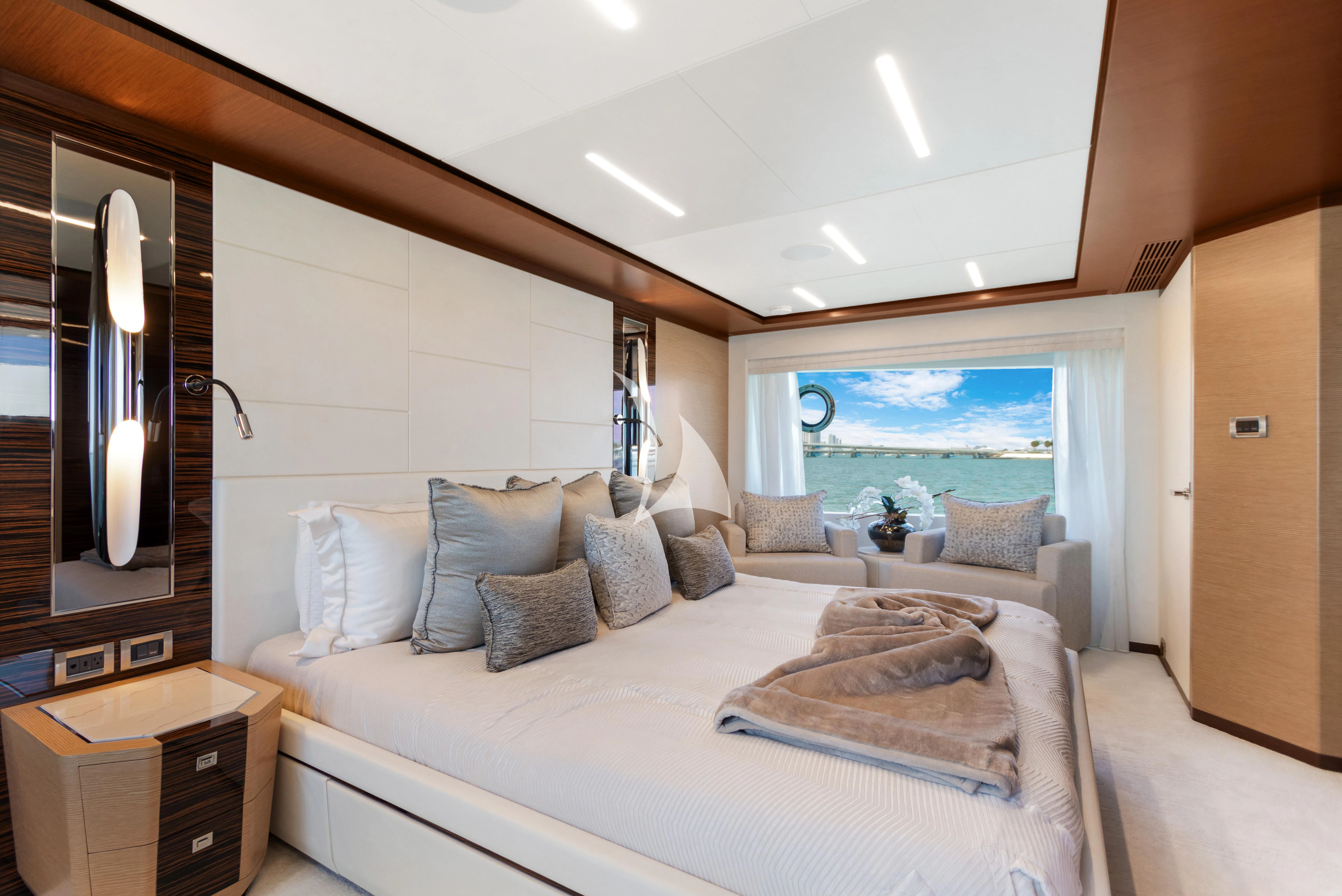 a large bed in a room aboard MAKE BIG HAPPEN Yacht for Sale
