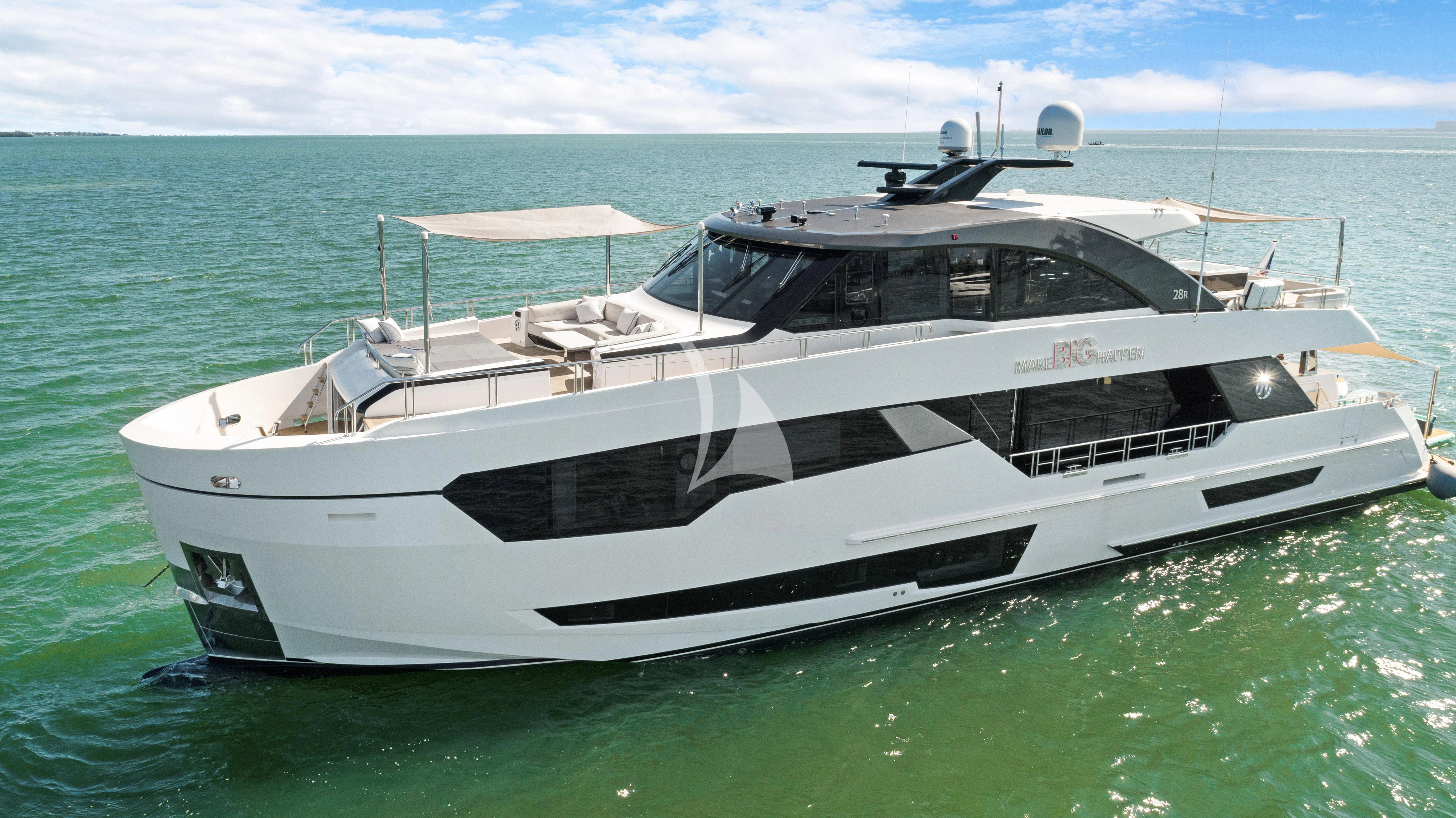 a white yacht in the water aboard MAKE BIG HAPPEN Yacht for Sale