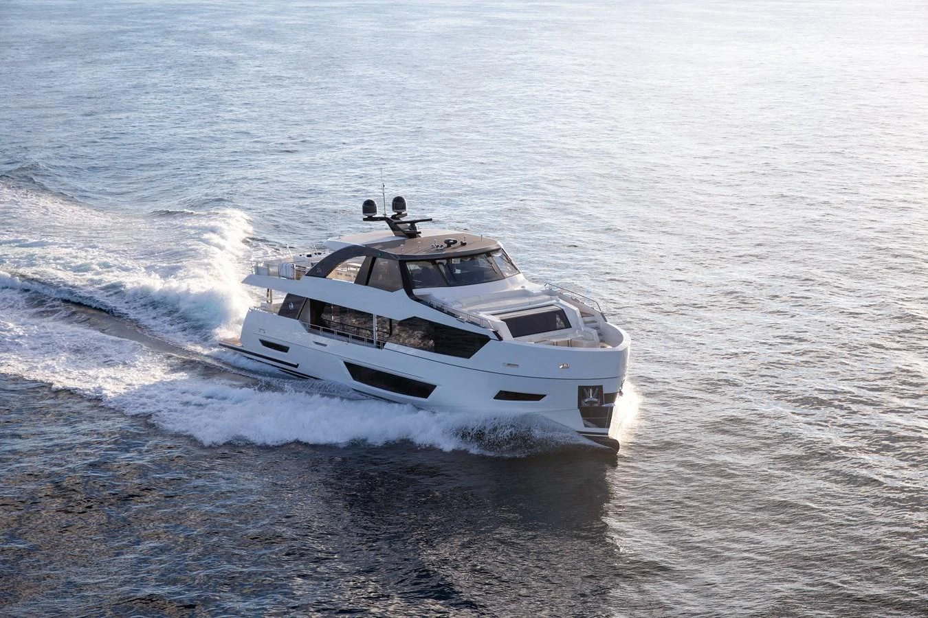 a white car driving on water aboard MAKE BIG HAPPEN Yacht for Sale