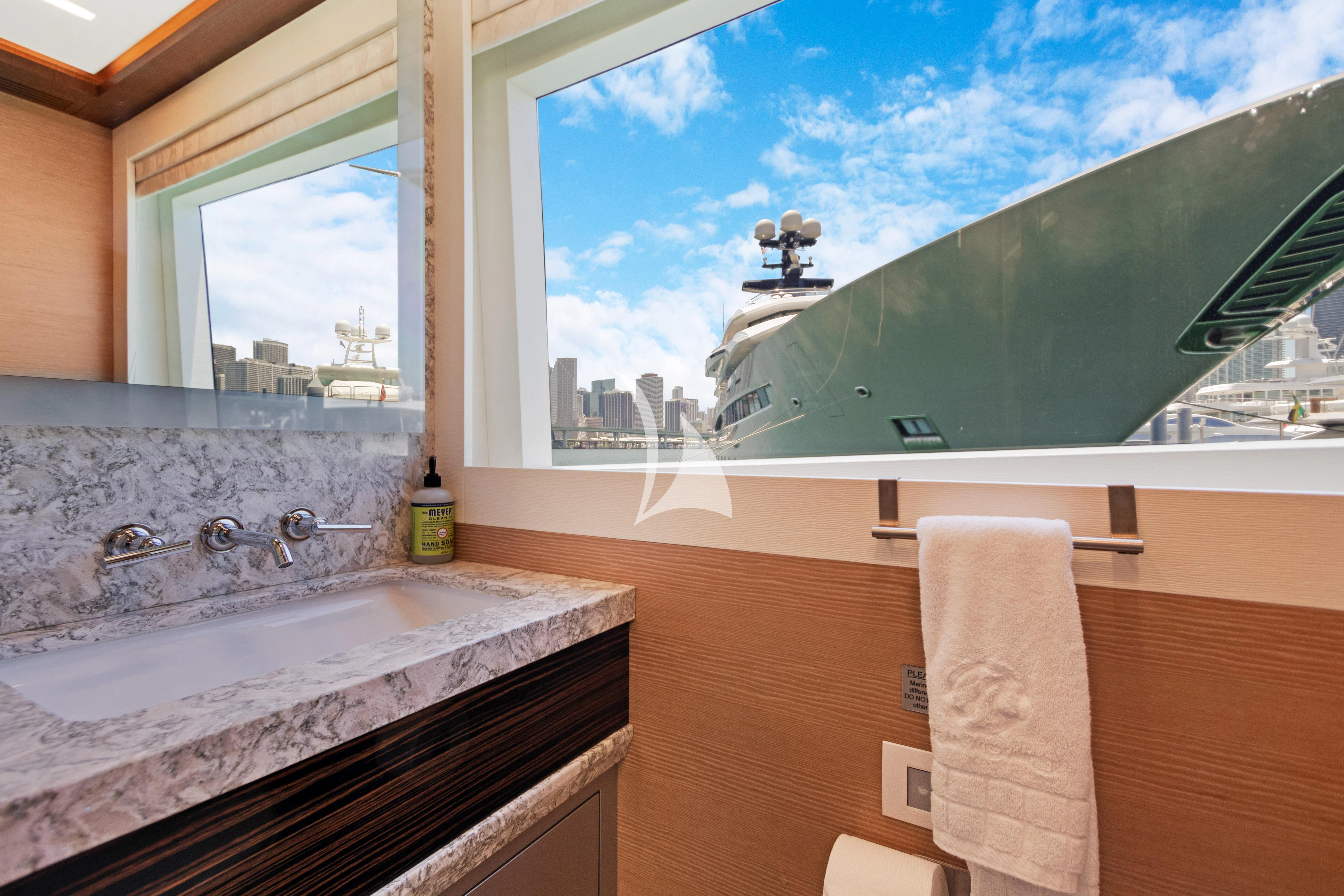 a bathtub and a sink in a bathroom aboard MAKE BIG HAPPEN Yacht for Sale