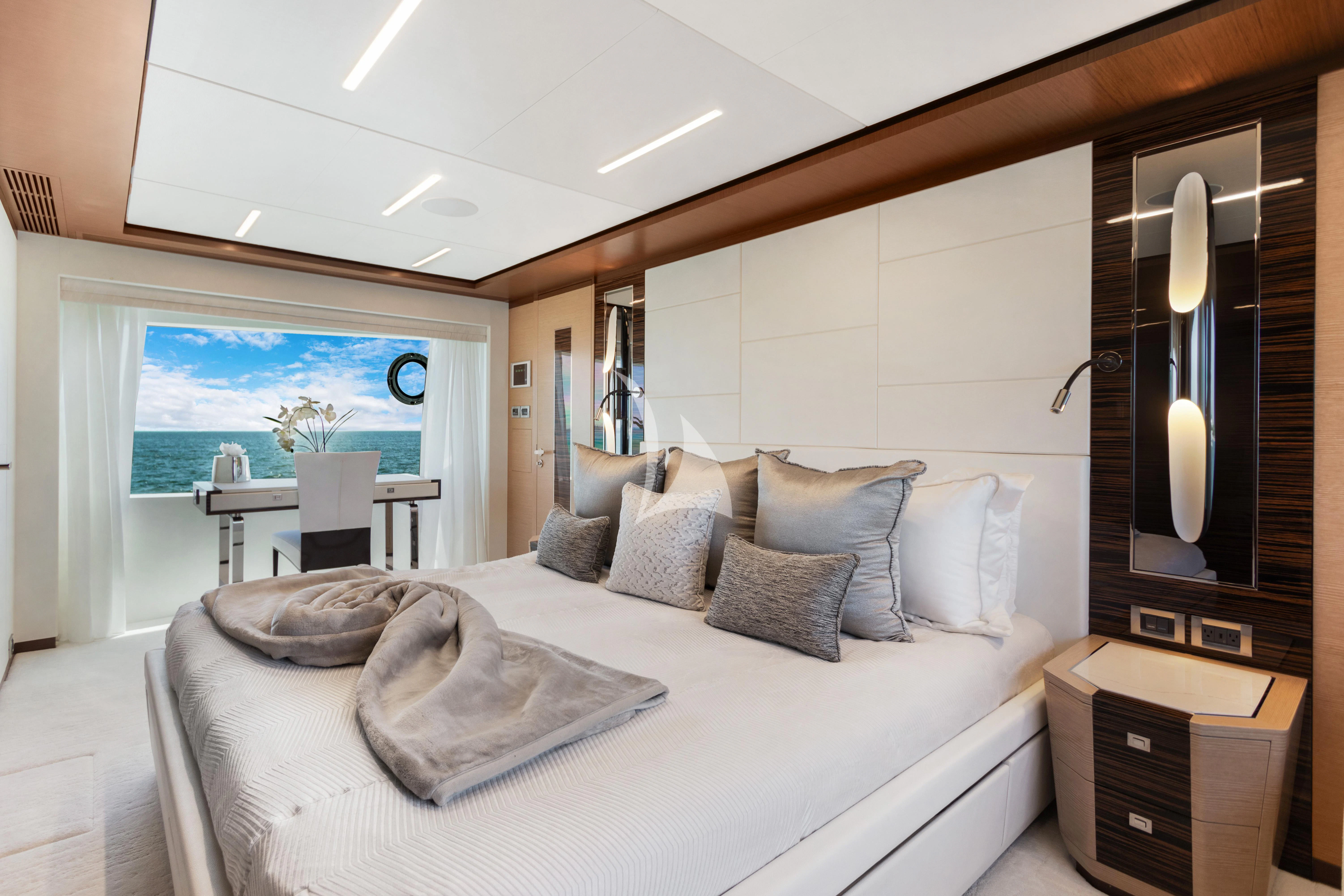 a large bedroom with a large bed aboard MAKE BIG HAPPEN Yacht for Sale