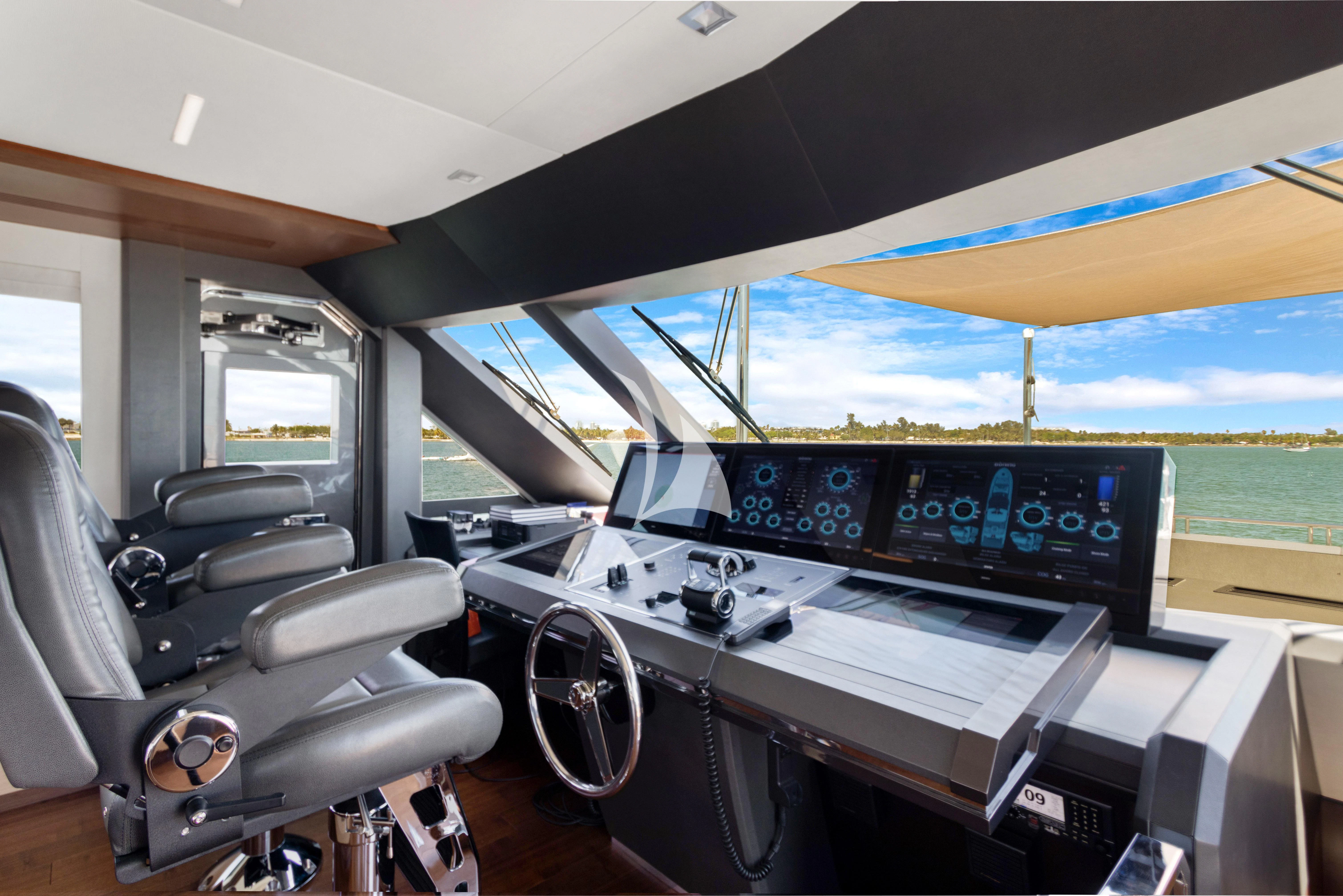 inside of a car aboard MAKE BIG HAPPEN Yacht for Sale