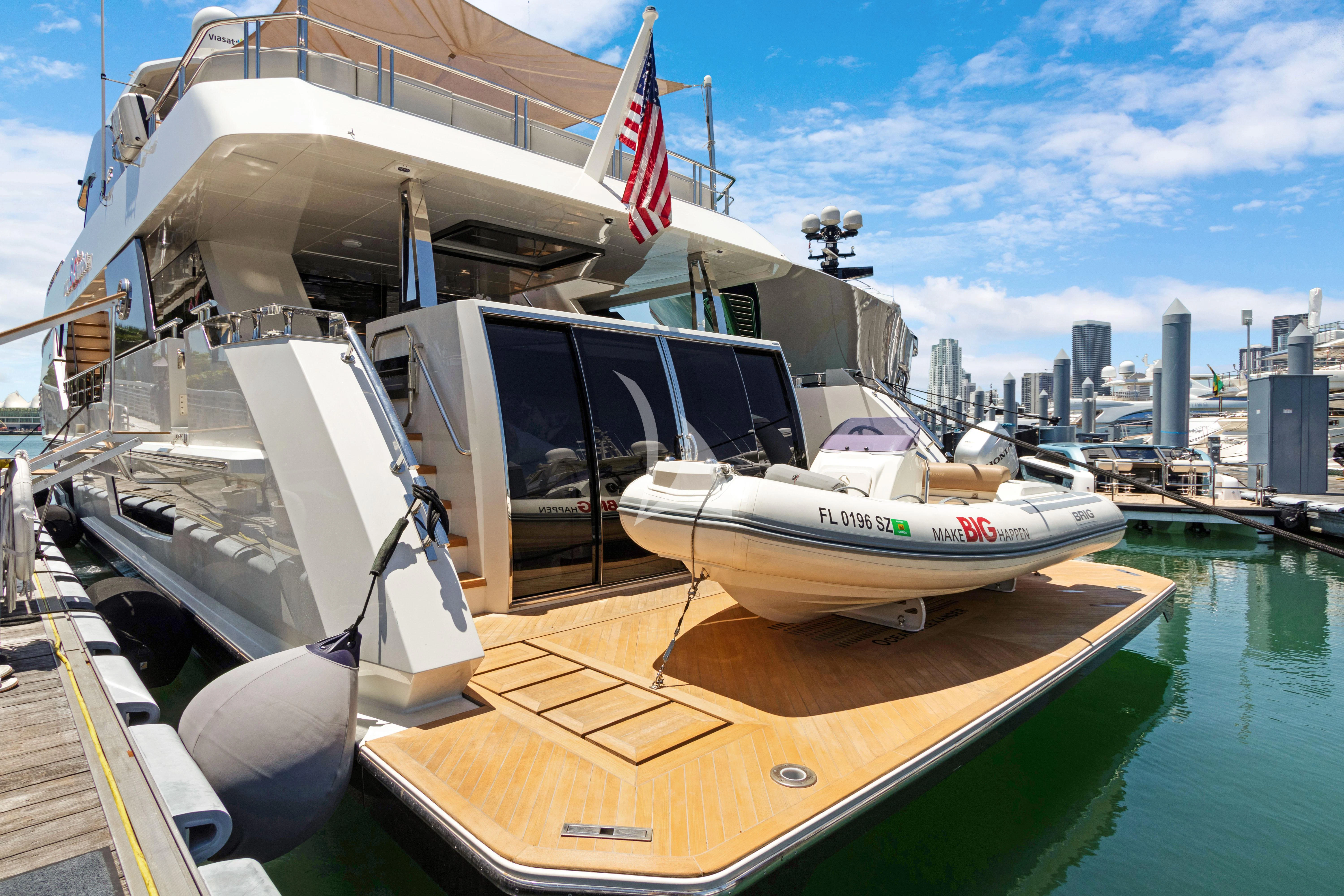 a boat docked at a pier aboard MAKE BIG HAPPEN Yacht for Sale