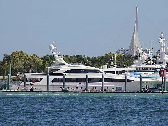 a large white boat in the water aboard USHER Yacht for Sale