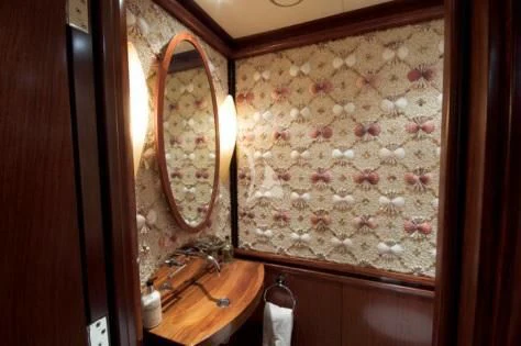 a mirror on a wall aboard USHER Yacht for Sale