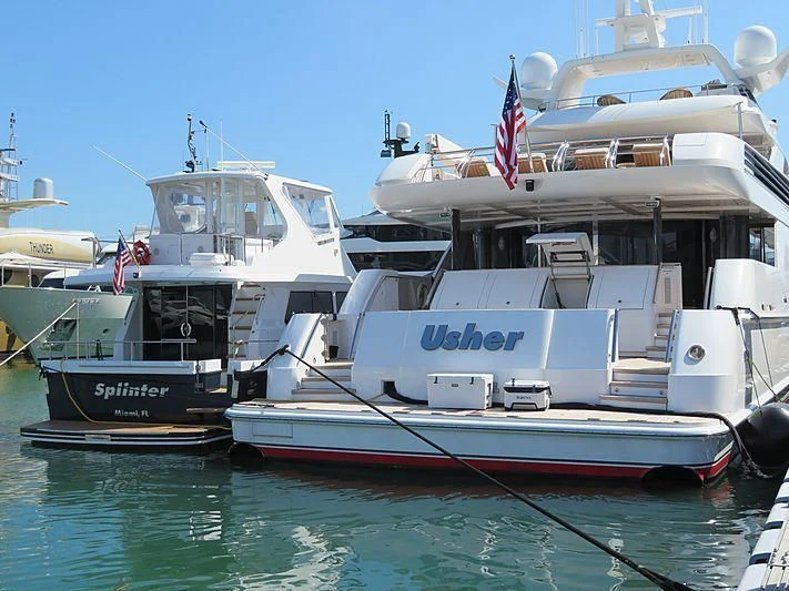 several boats docked at a pier aboard USHER Yacht for Sale