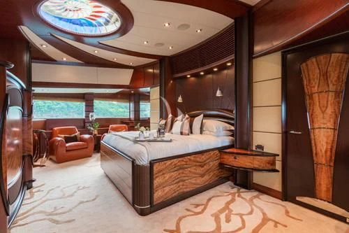 a large bedroom with a large bed aboard USHER Yacht for Sale