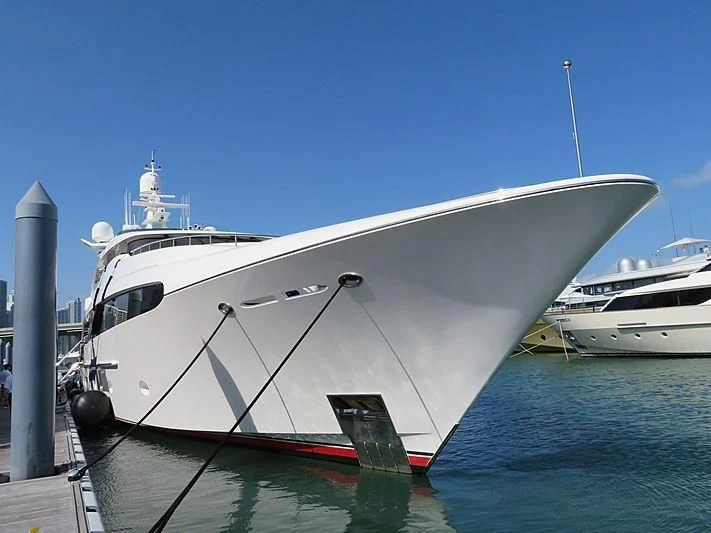 a large white yacht docked aboard USHER Yacht for Sale